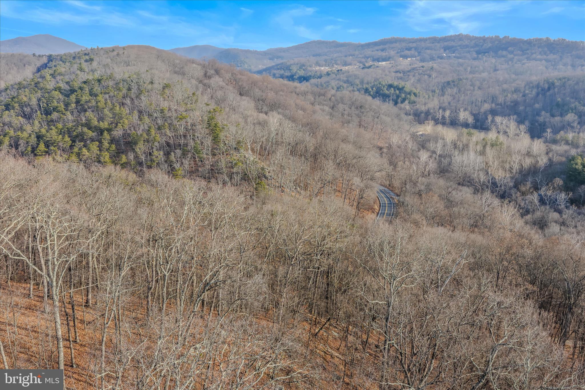 Quaint Acres Lane Berkeley Springs, WV 25411 - Photo 48 of 61 a view of a dry yard with mountains in the background