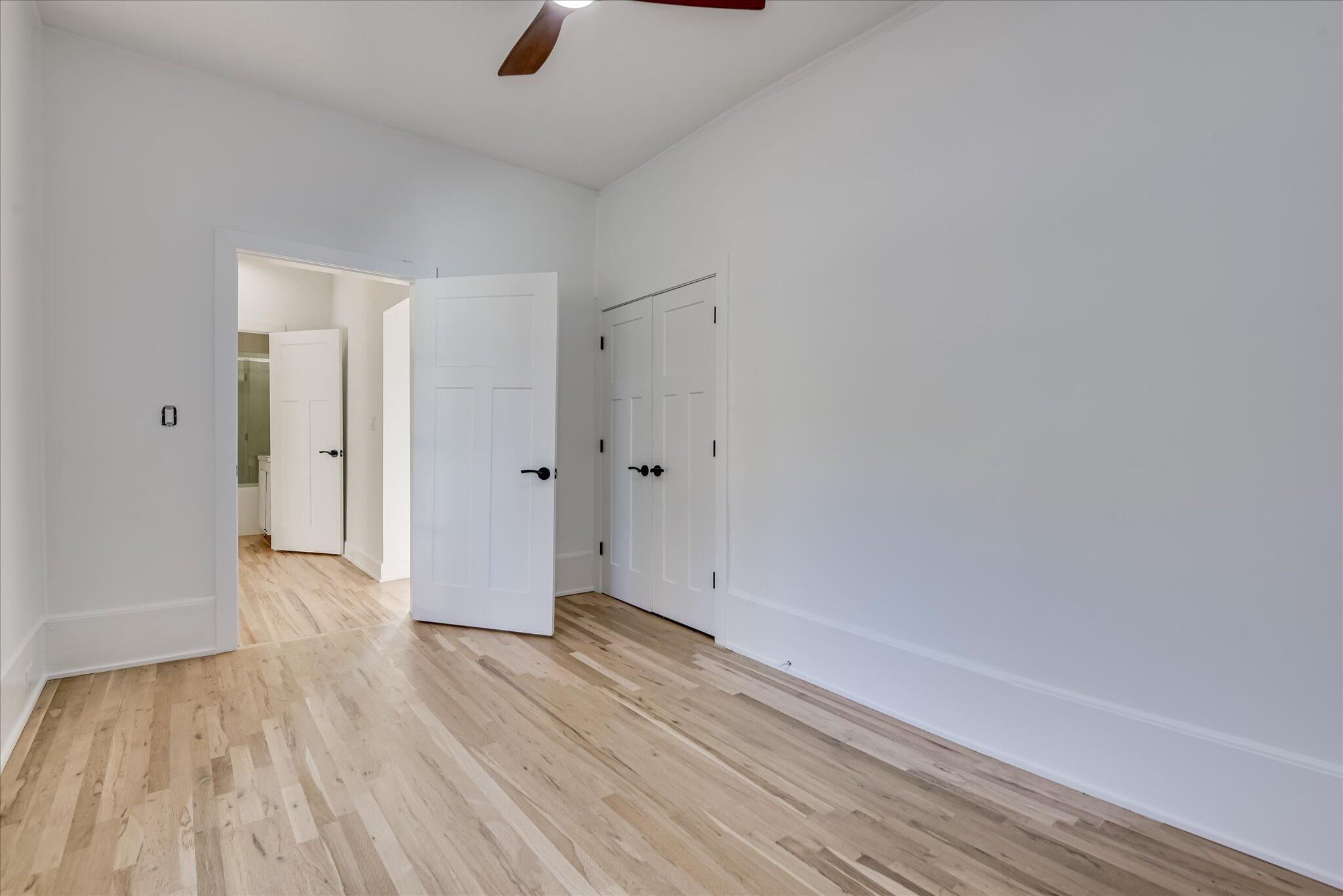 126 Mosley Road Aiken, SC 29801 - Photo 21 of 29 a view of an empty room with wooden floor