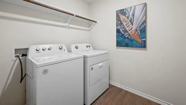 a utility room with dryer and washer