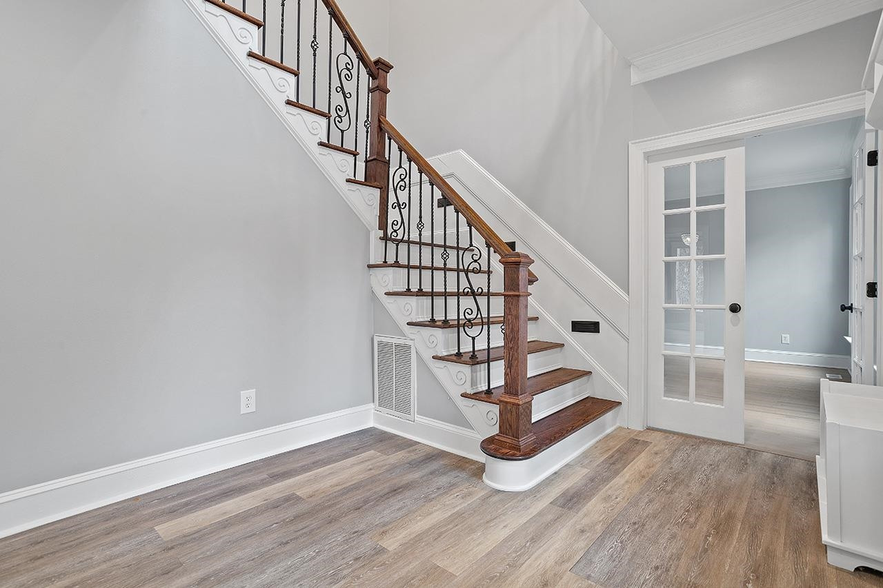 9132 Sutherland Court Raleigh, NC 27615 - Photo 3 of 36 Foyer stairwell