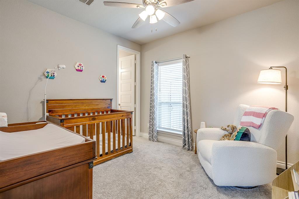 5709 Pope Creek Road Fort Worth, TX 76126 - Photo 22 of 39 A second bedroom ensuite is conveniently located on the main floor, making it ideal for guests or a nursery!