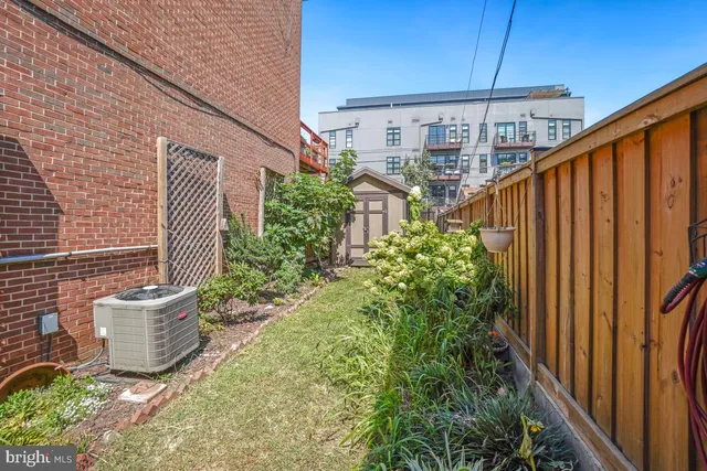 a balcony view with couple of chairs
