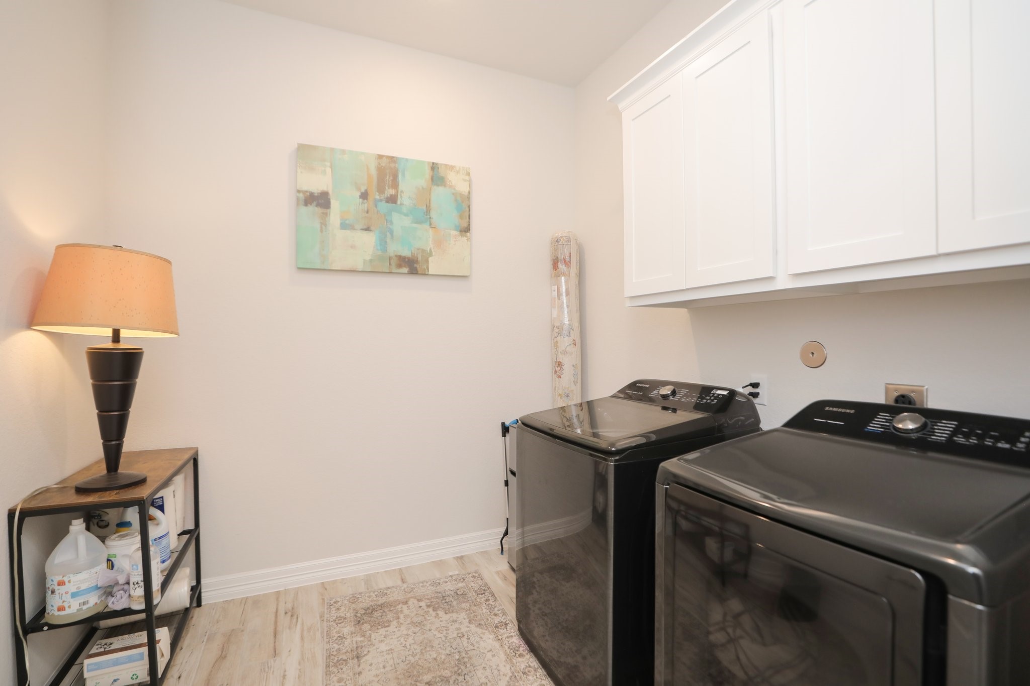 10134 Blythe Street Rosharon, TX 77583 - Photo 12 of 50 a utility room with dryer and washer