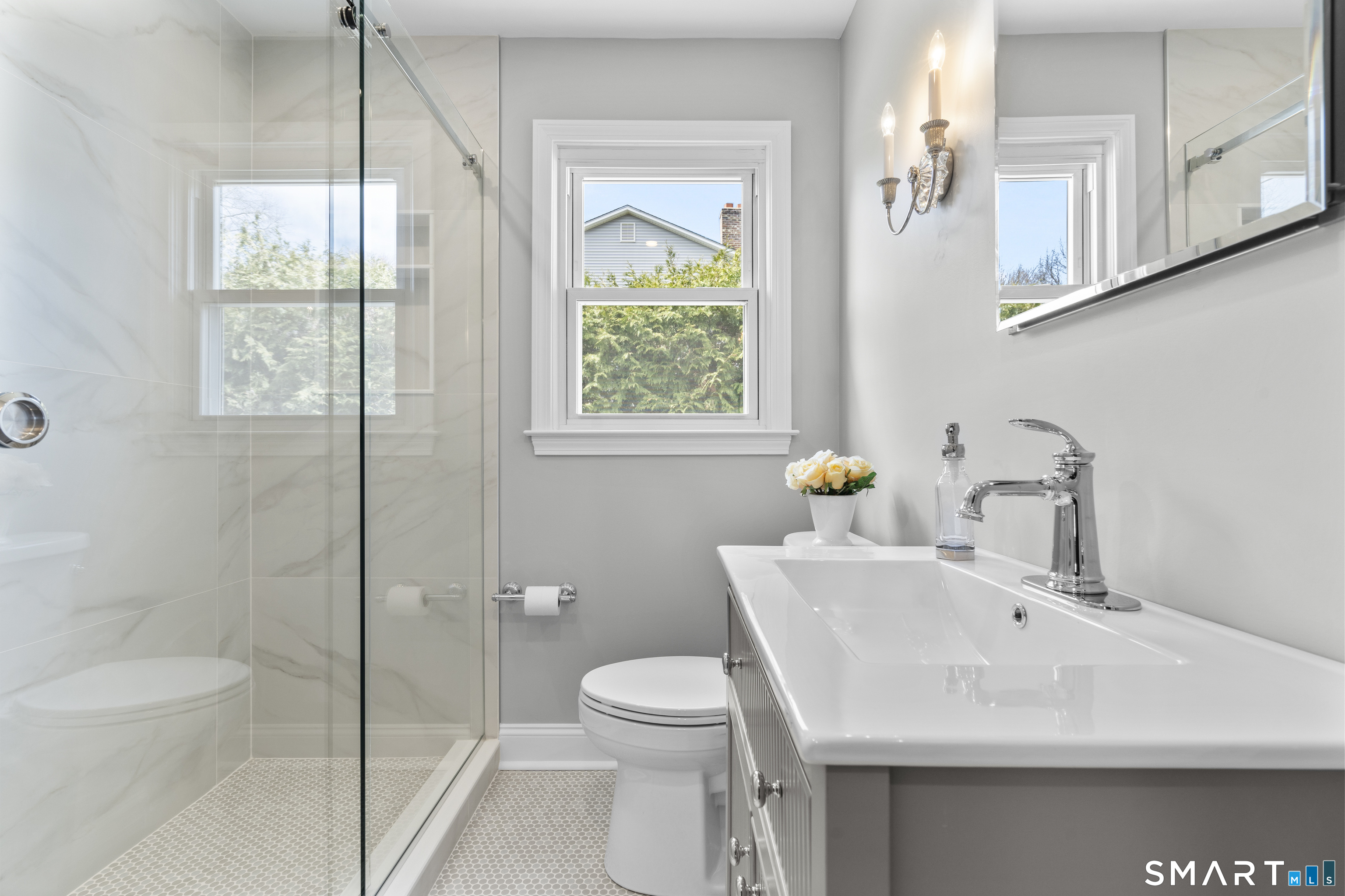 7 Fairview Avenue Trumbull, CT 06611 - Photo 11 of 19 a bathroom with a sink toilet and shower