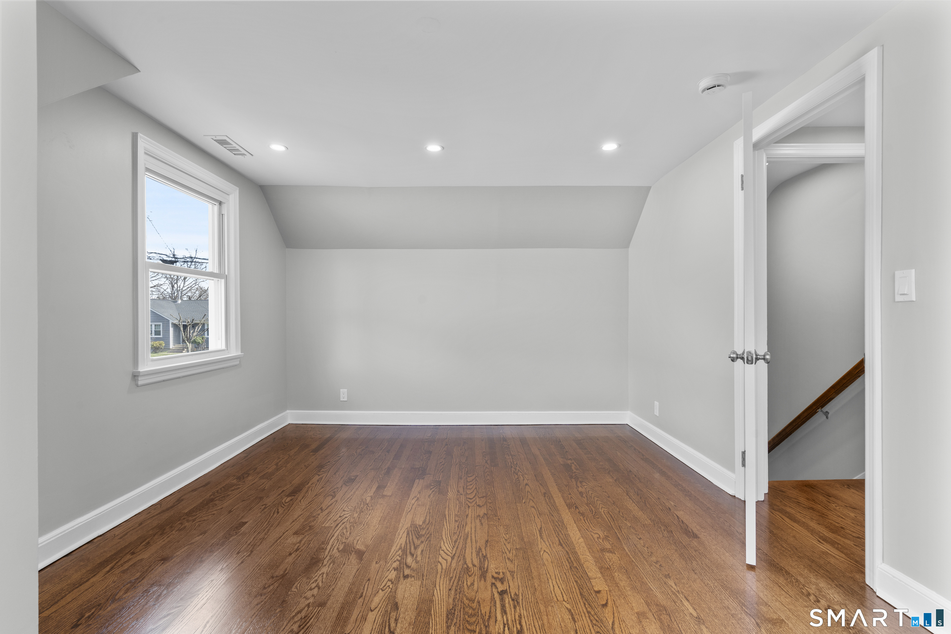 7 Fairview Avenue Trumbull, CT 06611 - Photo 12 of 19 a view of room with window and wooden floor