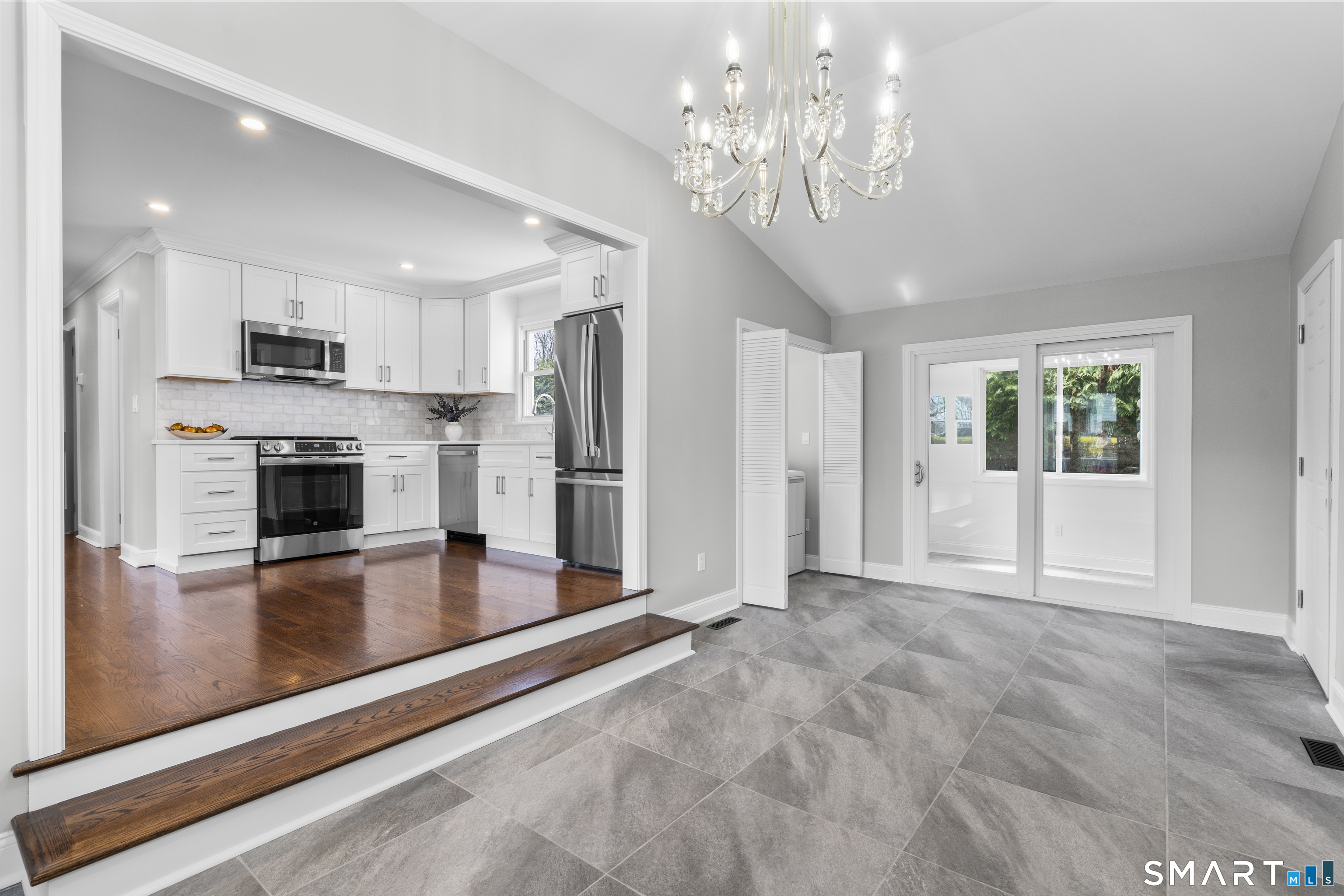 7 Fairview Avenue Trumbull, CT 06611 - Photo 4 of 19 a view of a kitchen with a sink and a refrigerator