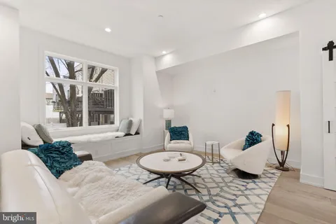 a kitchen with stainless steel appliances kitchen island granite countertop a sink and cabinets