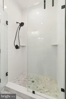 a bedroom with a bed and a cabinets