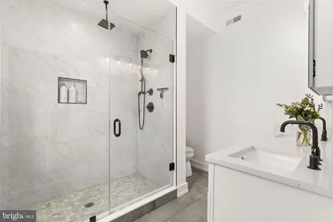 a patio with patio a couch and chairs