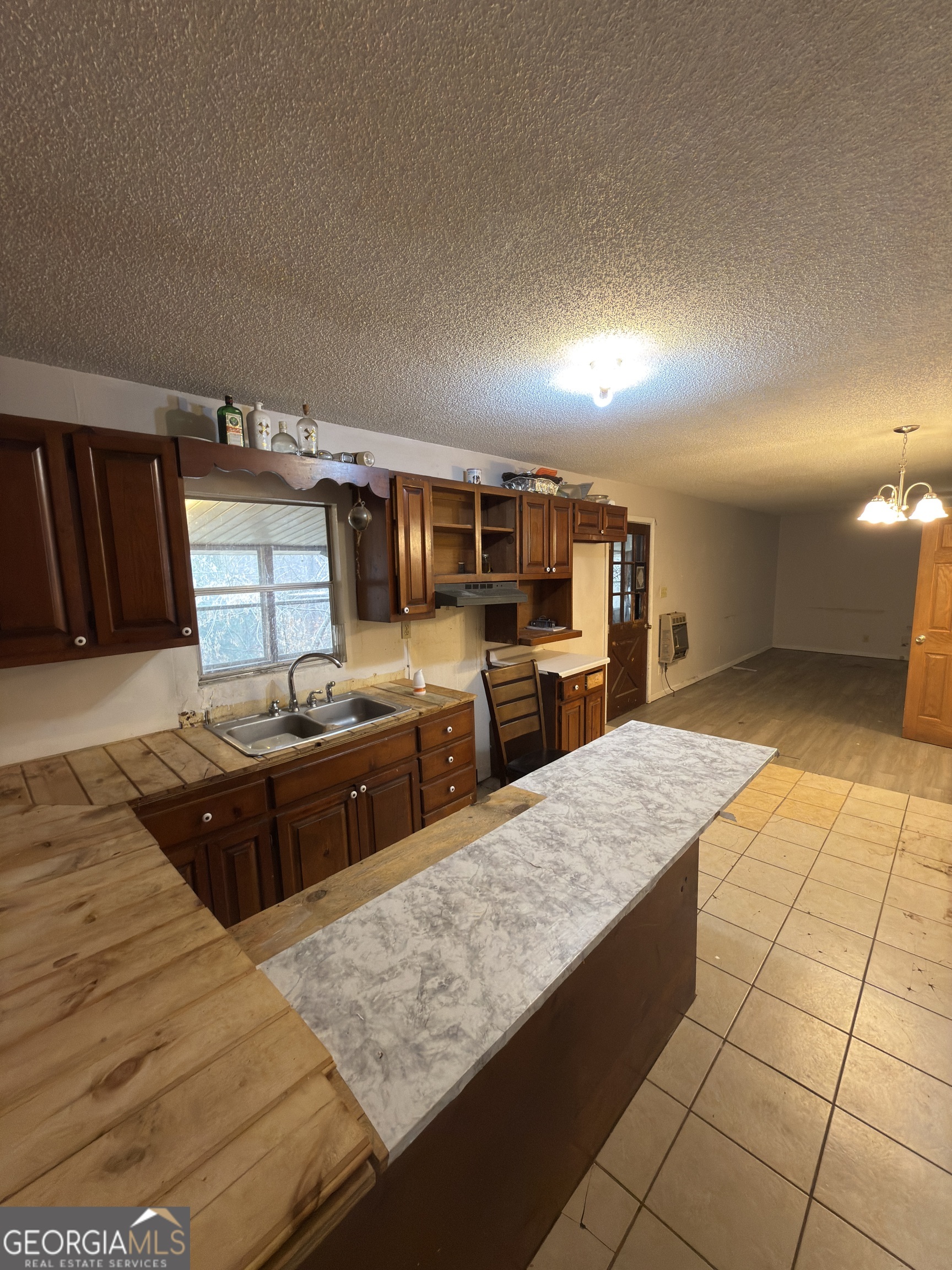72 Ridgeview Court Lavonia, GA 30553 - Photo 16 of 47 a kitchen with stainless steel appliances granite countertop a sink stove and granite counter top