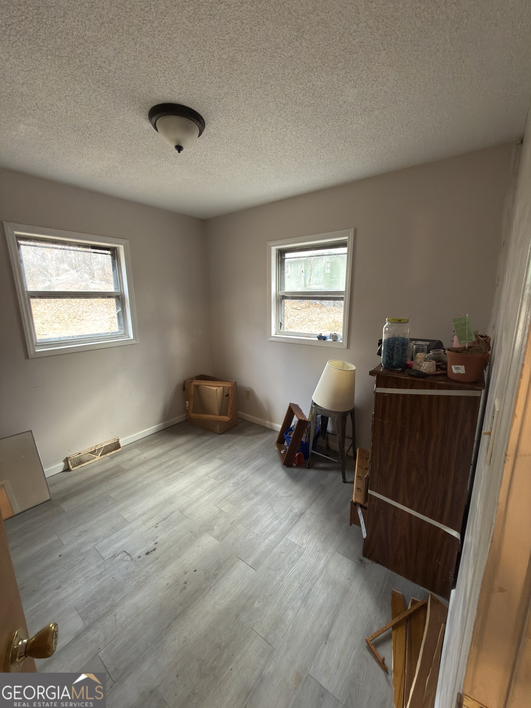 72 Ridgeview Court Lavonia, GA 30553 - Photo 19 of 47 a living room with furniture and a window
