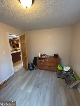 a bathroom with a toilet and shower