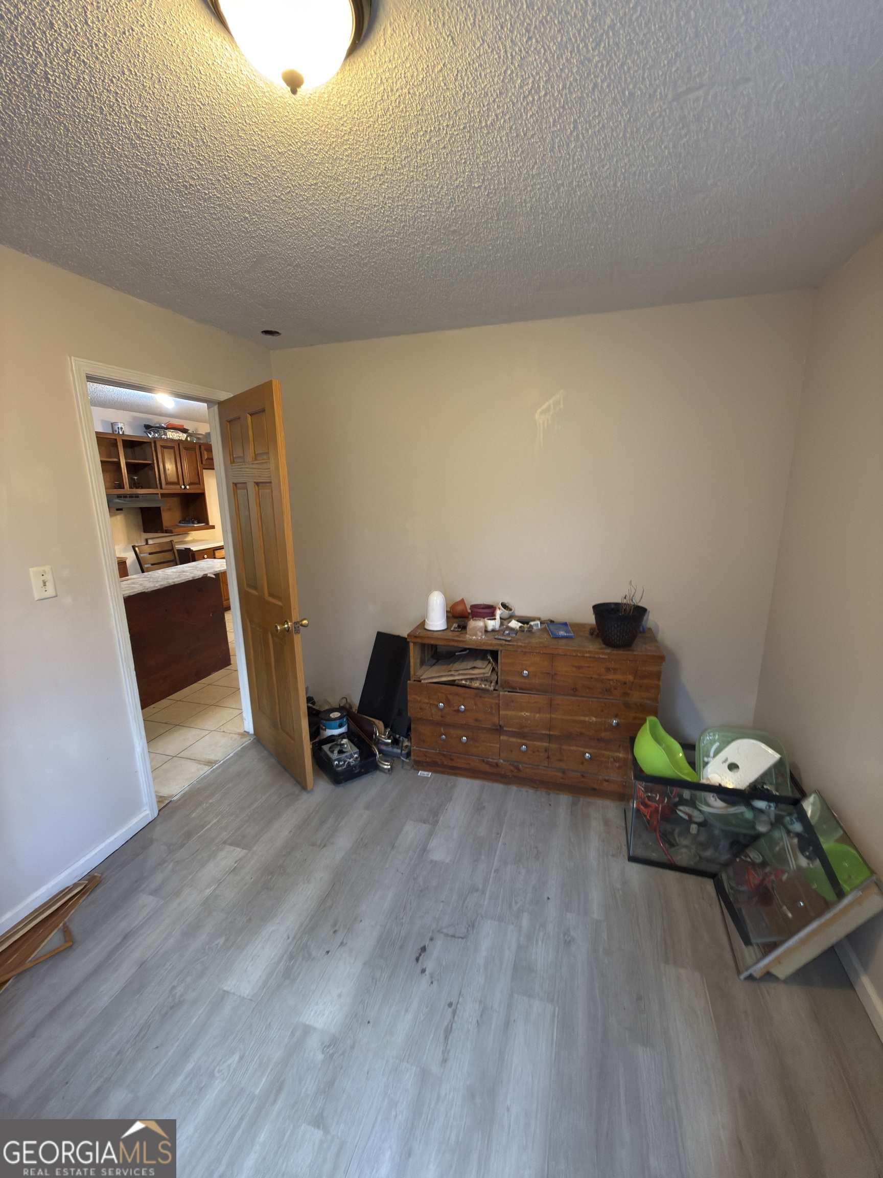 72 Ridgeview Court Lavonia, GA 30553 - Photo 22 of 47 a living room with furniture and a wooden floor