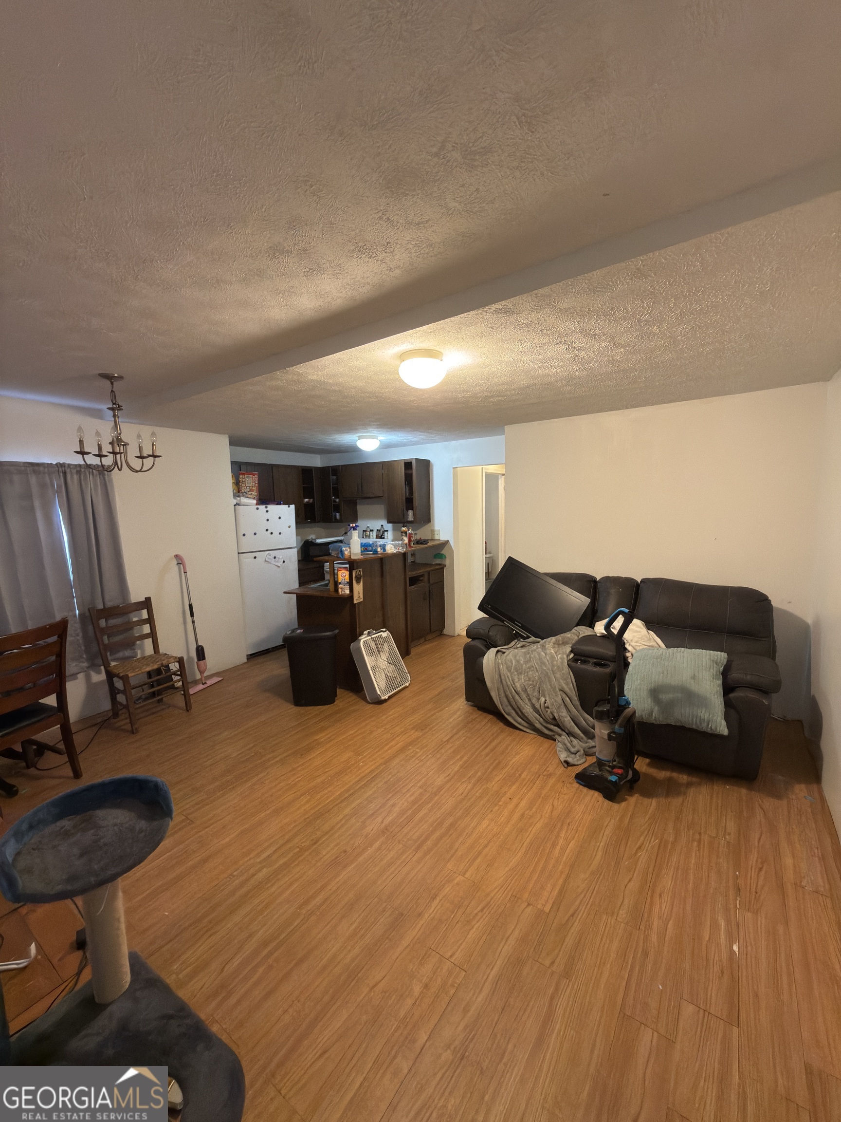 72 Ridgeview Court Lavonia, GA 30553 - Photo 35 of 47 a living room with furniture and a wooden floor