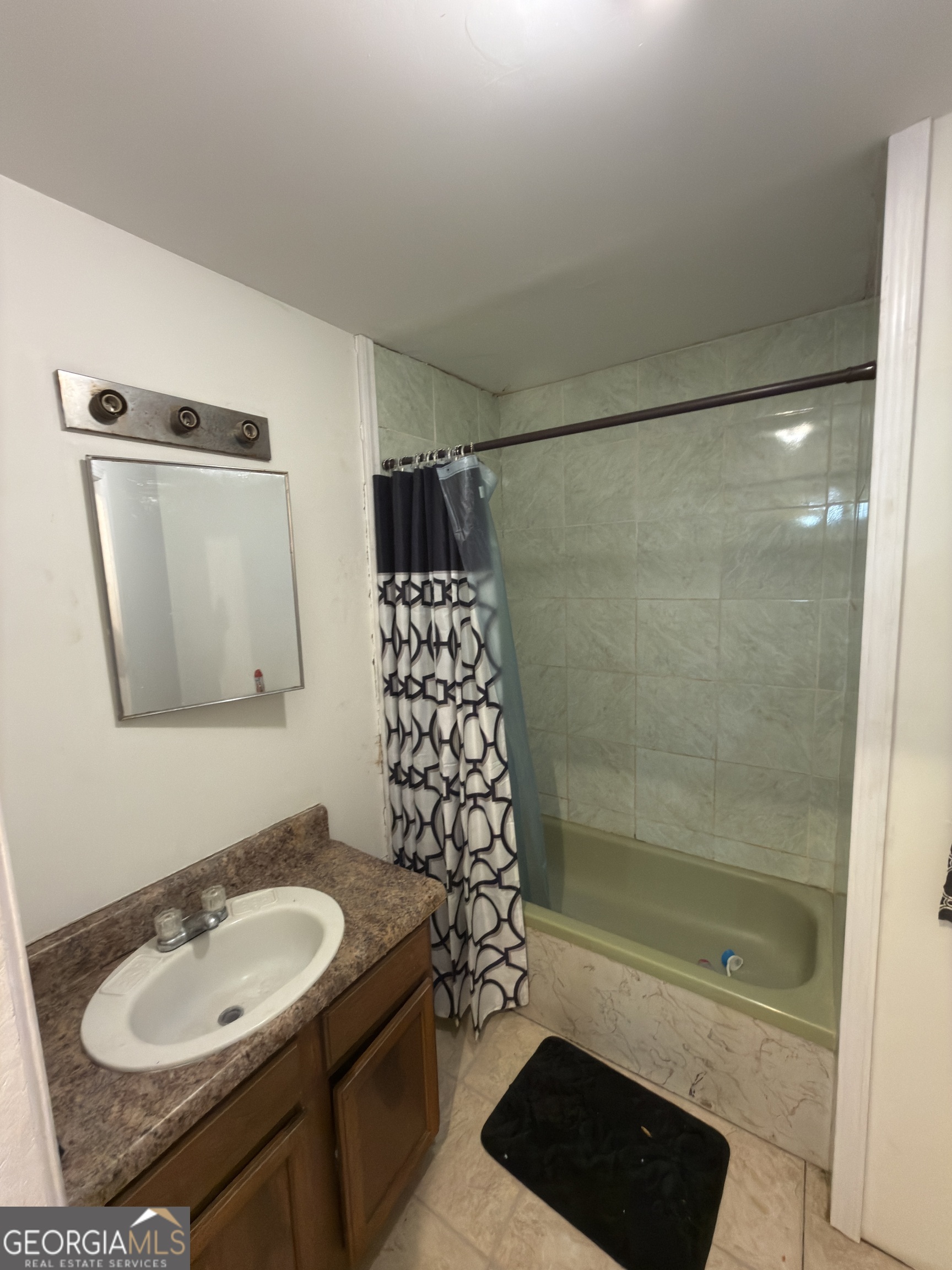 72 Ridgeview Court Lavonia, GA 30553 - Photo 37 of 47 a bathroom with a granite countertop sink a toilet and shower