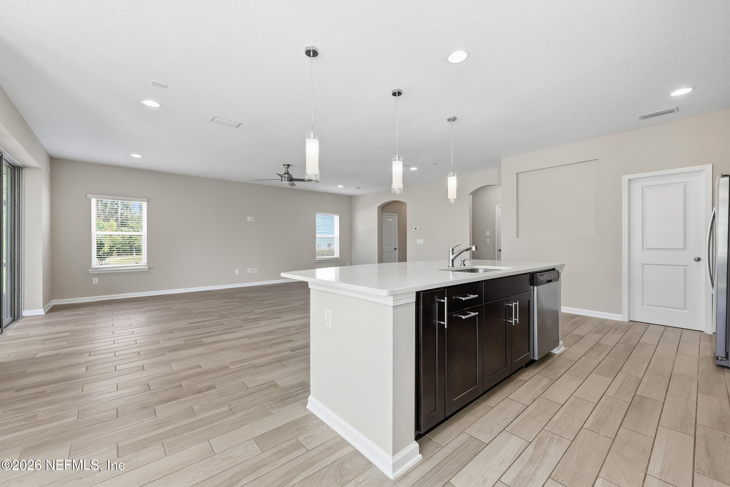 95 Strobe Court St. Augustine, FL 32095 - Photo 14 of 71 a kitchen with a sink cabinets and wooden floor