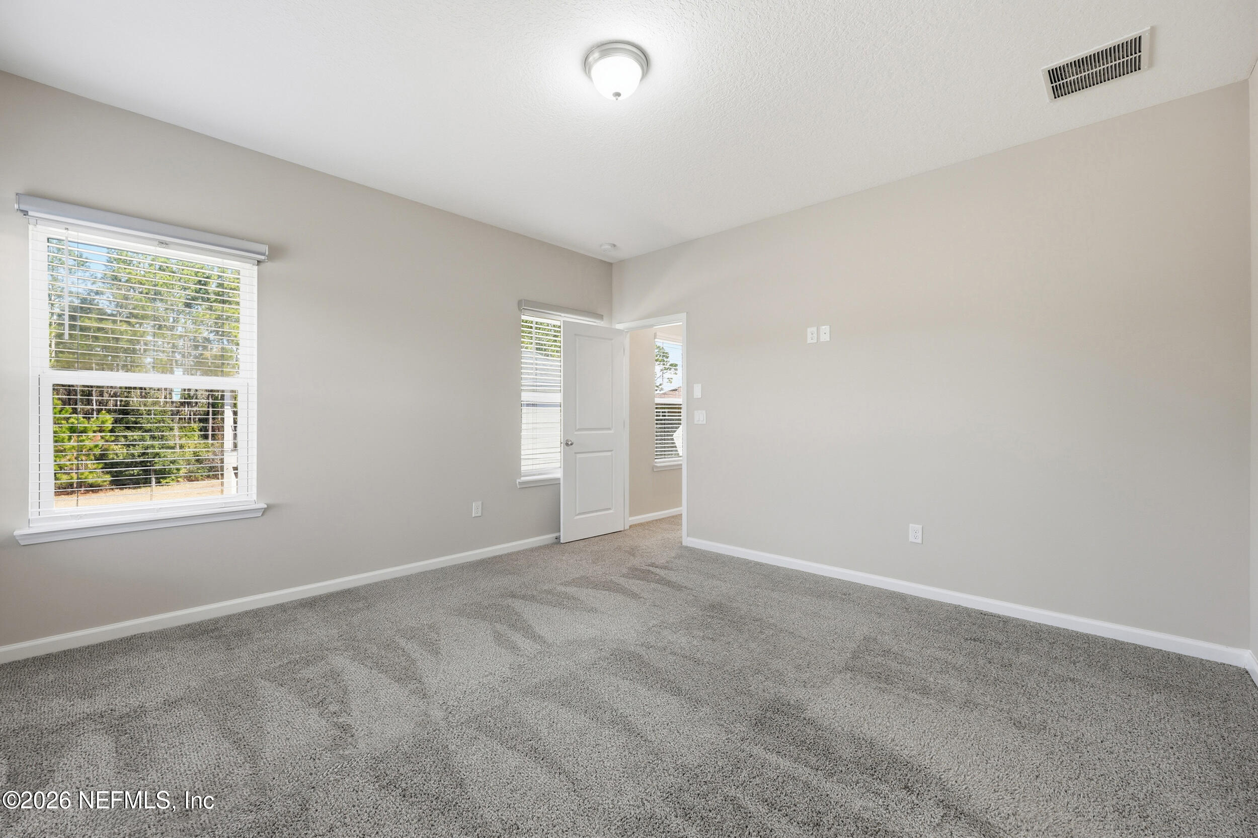 95 Strobe Court St. Augustine, FL 32095 - Photo 23 of 71 a view of an empty room with a window