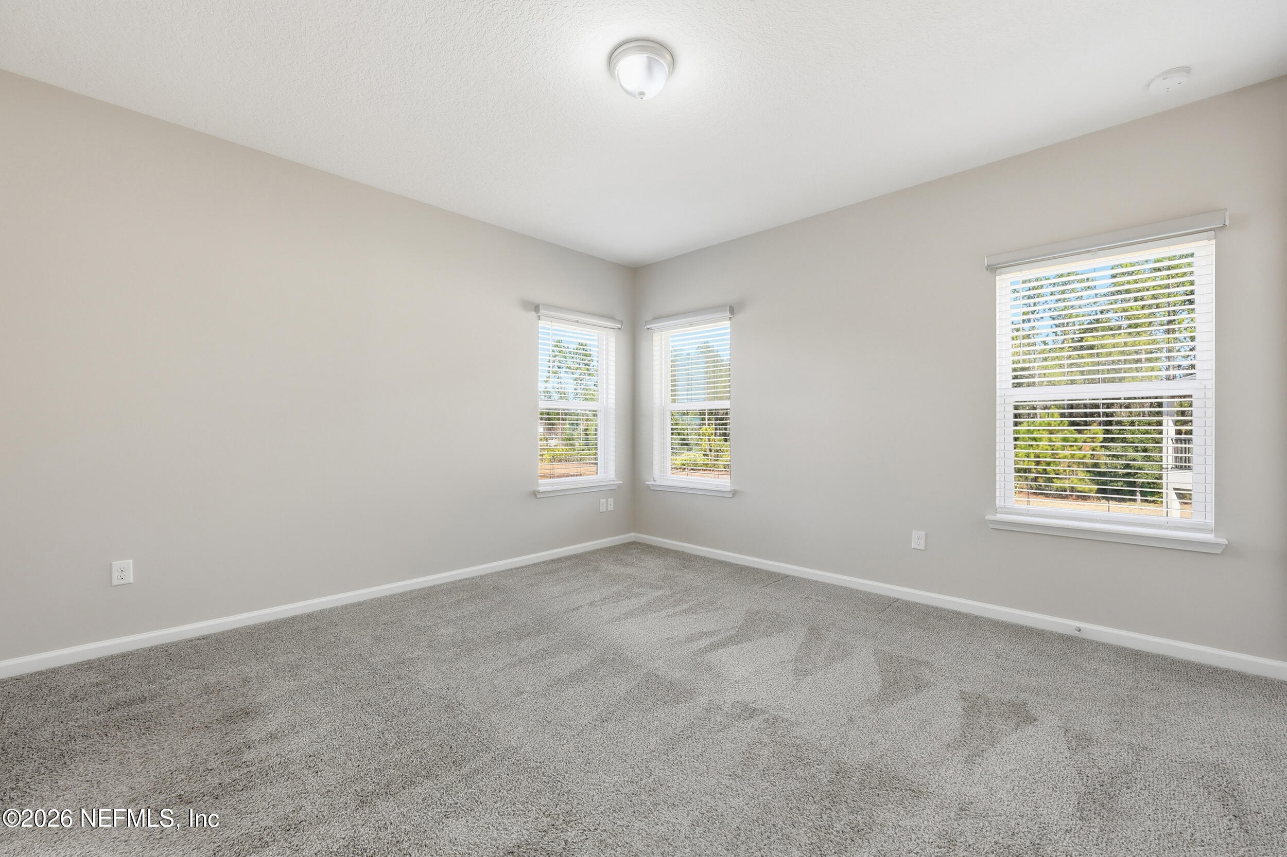 95 Strobe Court St. Augustine, FL 32095 - Photo 24 of 71 an empty room with windows