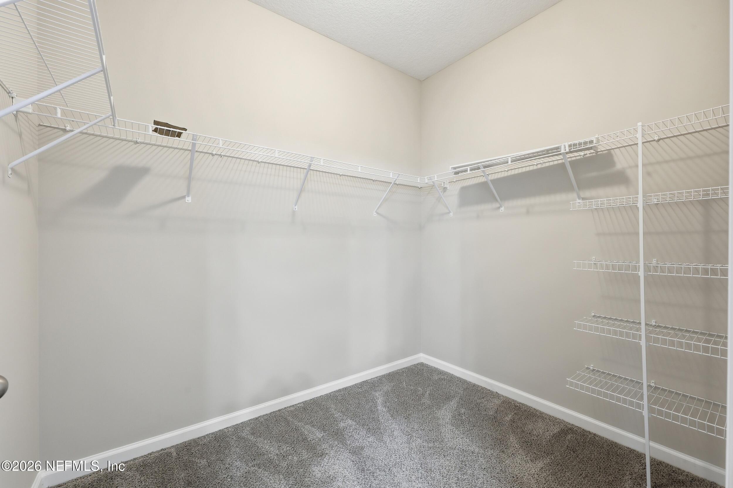 95 Strobe Court St. Augustine, FL 32095 - Photo 27 of 71 a view of a room with racks on the wall