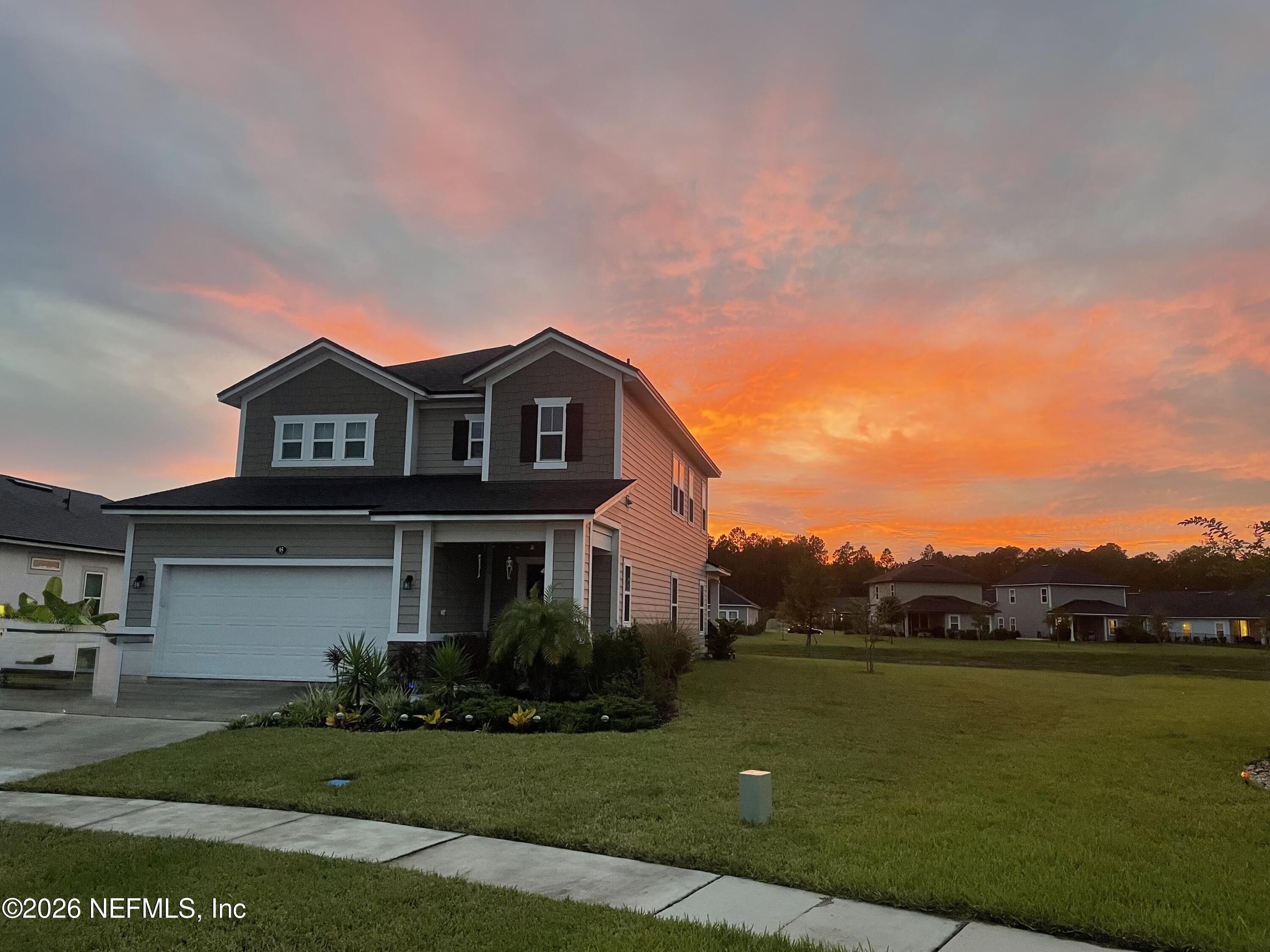 95 Strobe Court St. Augustine, FL 32095 - Photo 43 of 71 a view of a big house with a big yard and large trees