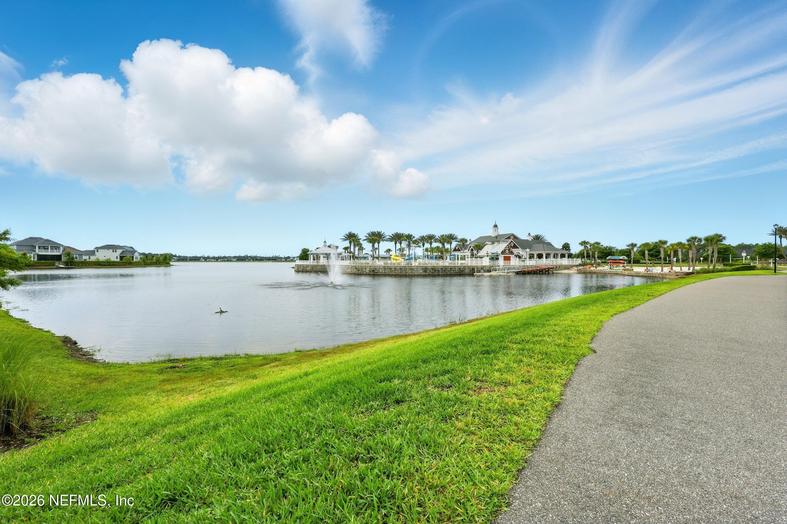 95 Strobe Court St. Augustine, FL 32095 - Photo 65 of 71 a view of a lake with a big yard and large trees