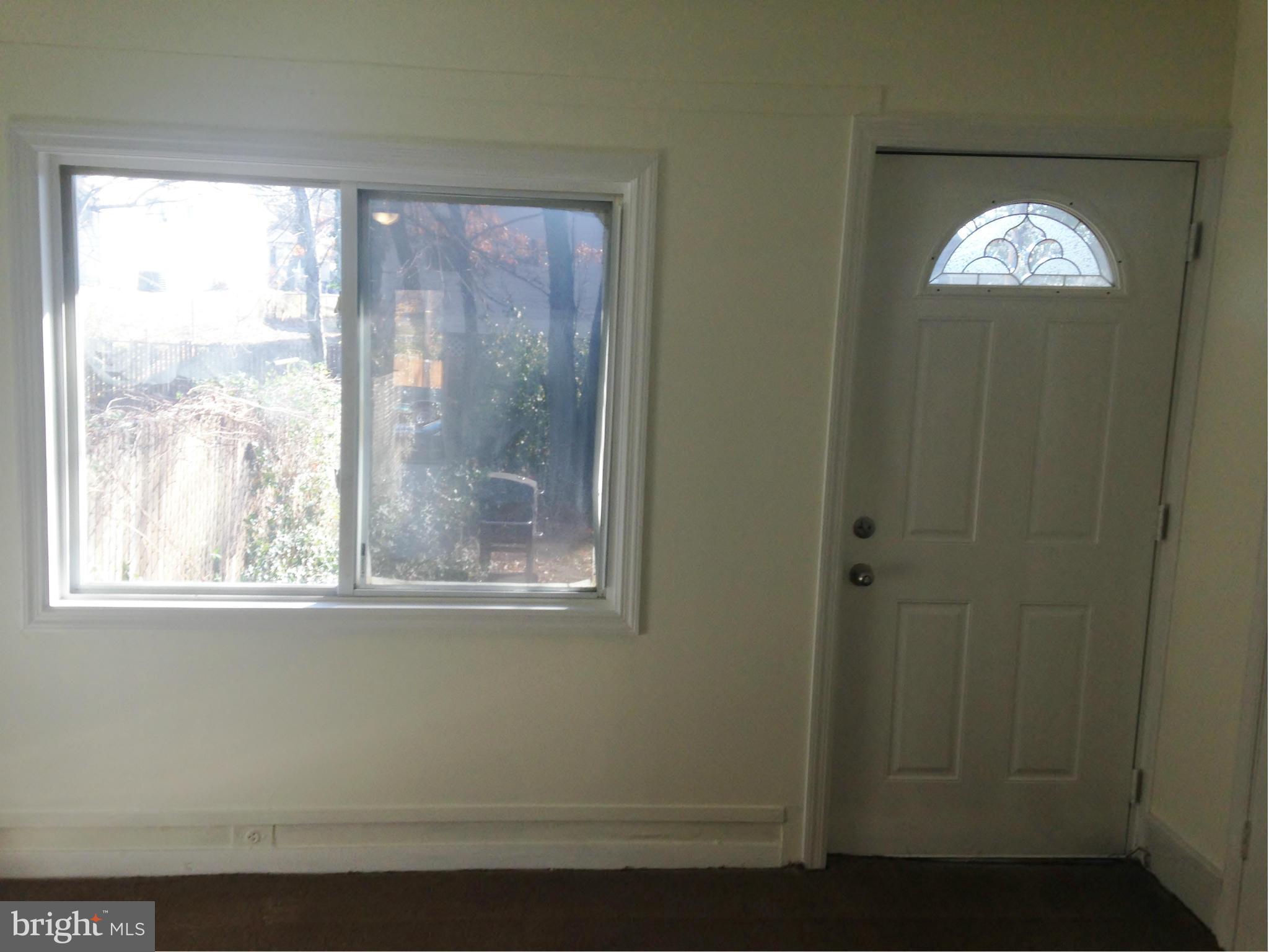 7721 Muncy Road Landover, MD 20785 - Photo 4 of 14 Liv Room Exit