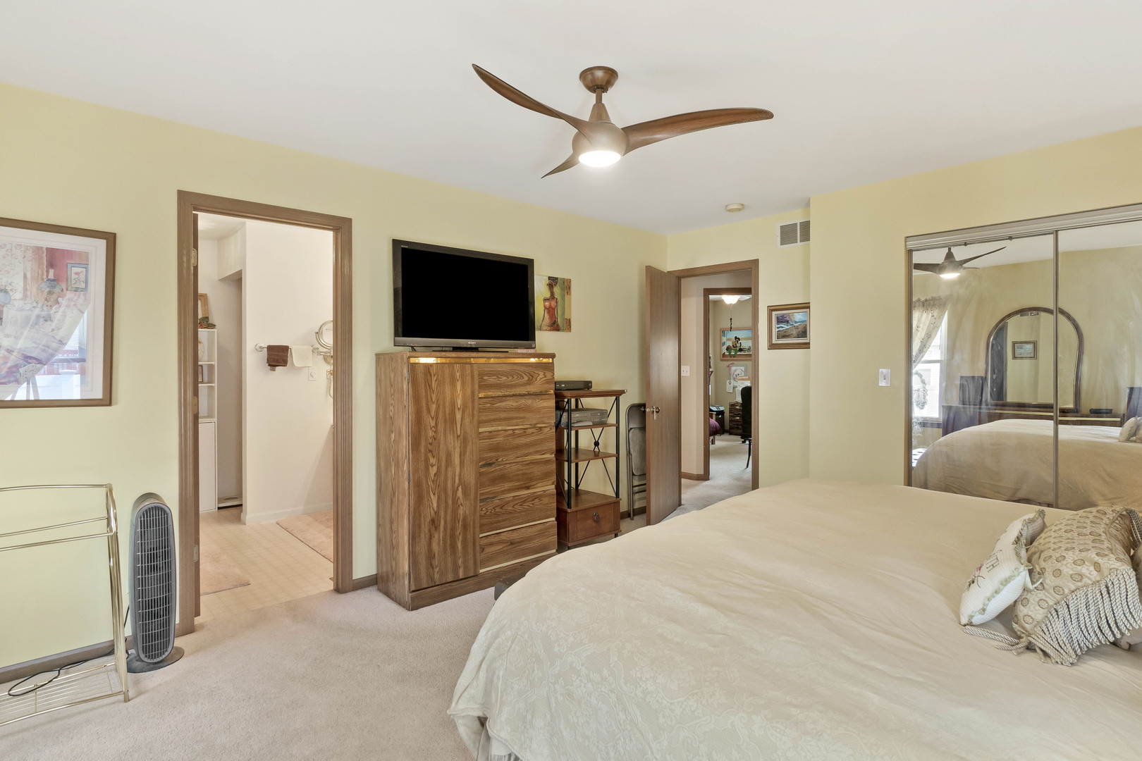 374 Fox Bend Circle Bolingbrook, IL 60440 - Photo 15 of 32 a bedroom with a bed and a flat screen tv