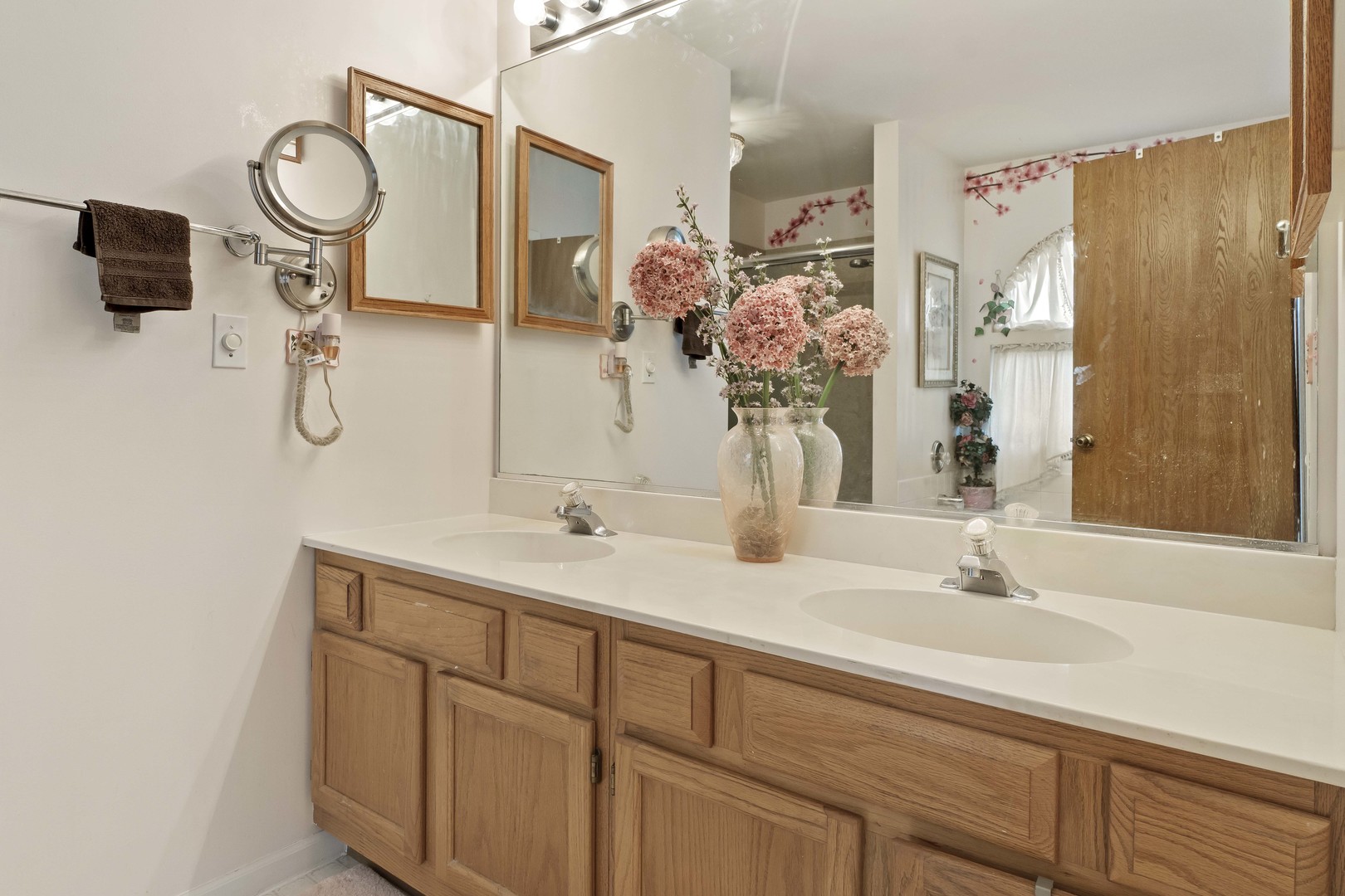 374 Fox Bend Circle Bolingbrook, IL 60440 - Photo 17 of 32 a bathroom with a sink and a mirror