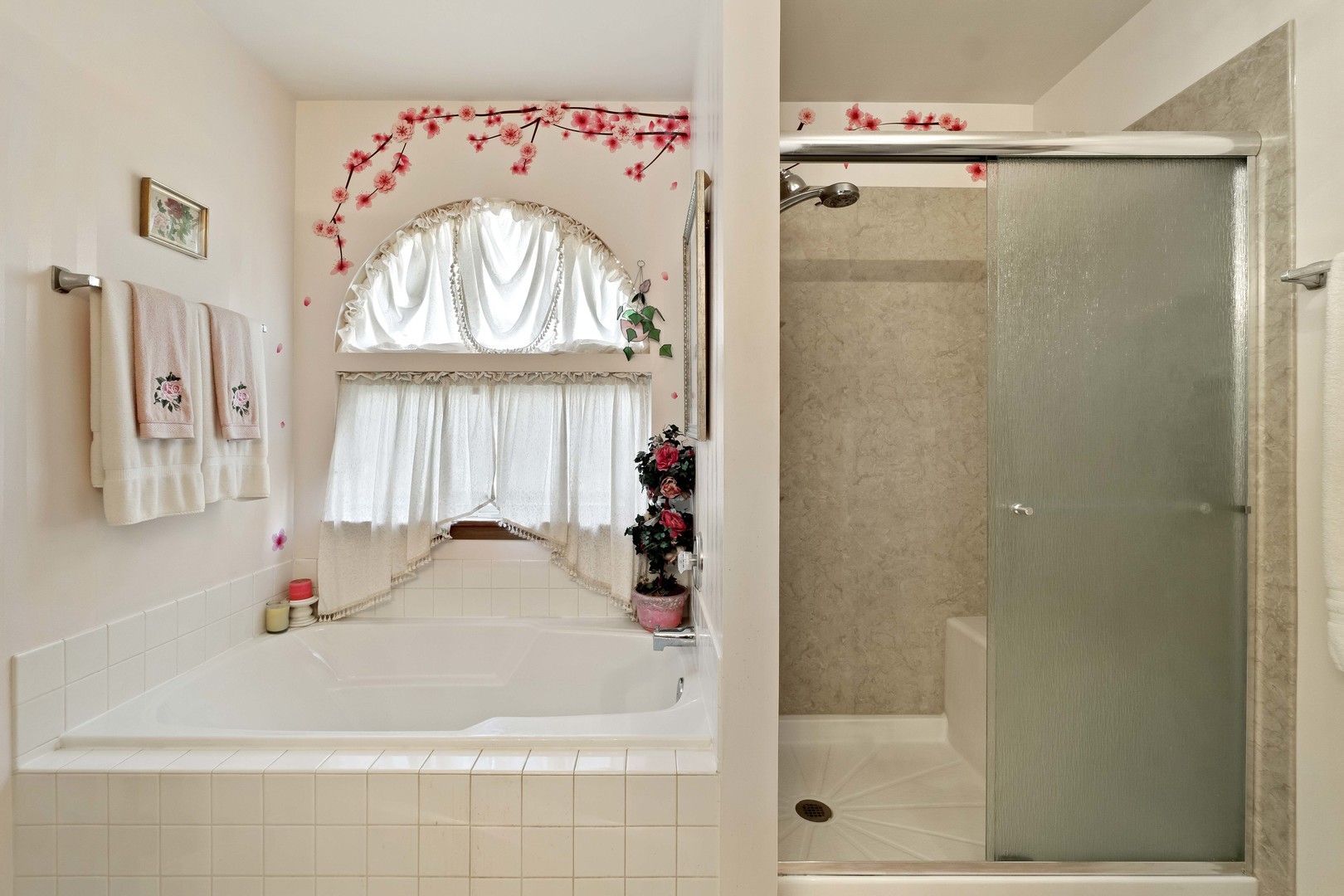 374 Fox Bend Circle Bolingbrook, IL 60440 - Photo 18 of 32 a bathroom with a bathtub and a shower