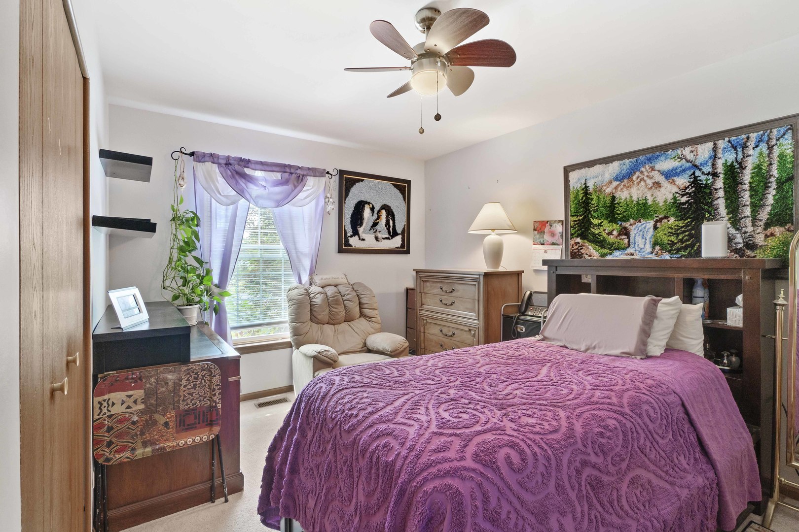 374 Fox Bend Circle Bolingbrook, IL 60440 - Photo 19 of 32 a bedroom with a large bed and a chandelier