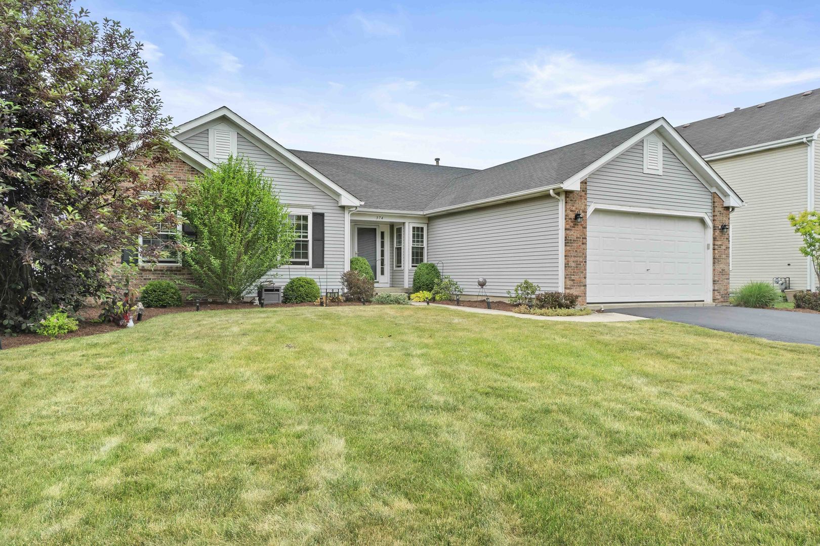 374 Fox Bend Circle Bolingbrook, IL 60440 - Photo 2 of 32 a view of a house with backyard and garden