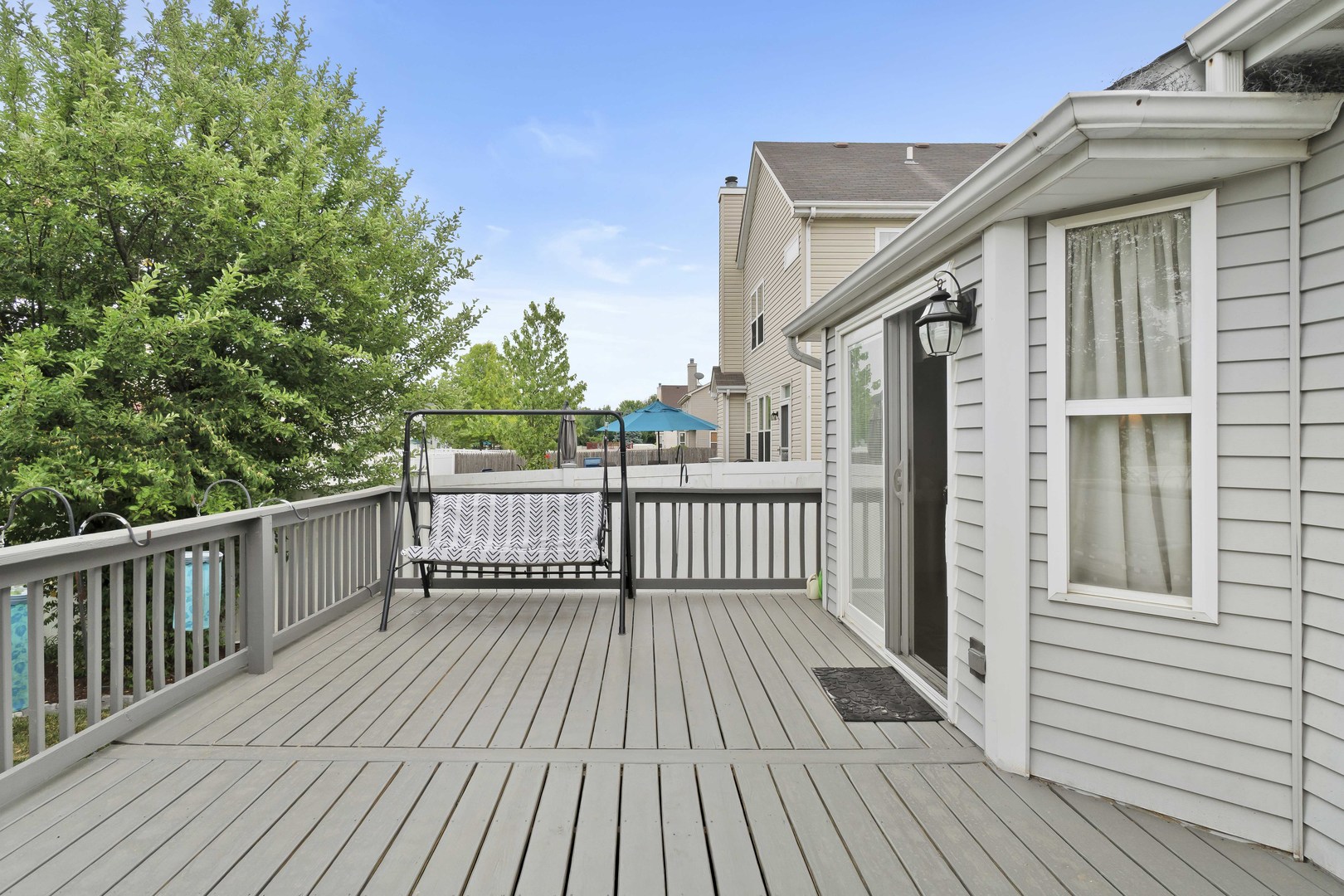 374 Fox Bend Circle Bolingbrook, IL 60440 - Photo 26 of 32 a view of a wooden deck with large trees