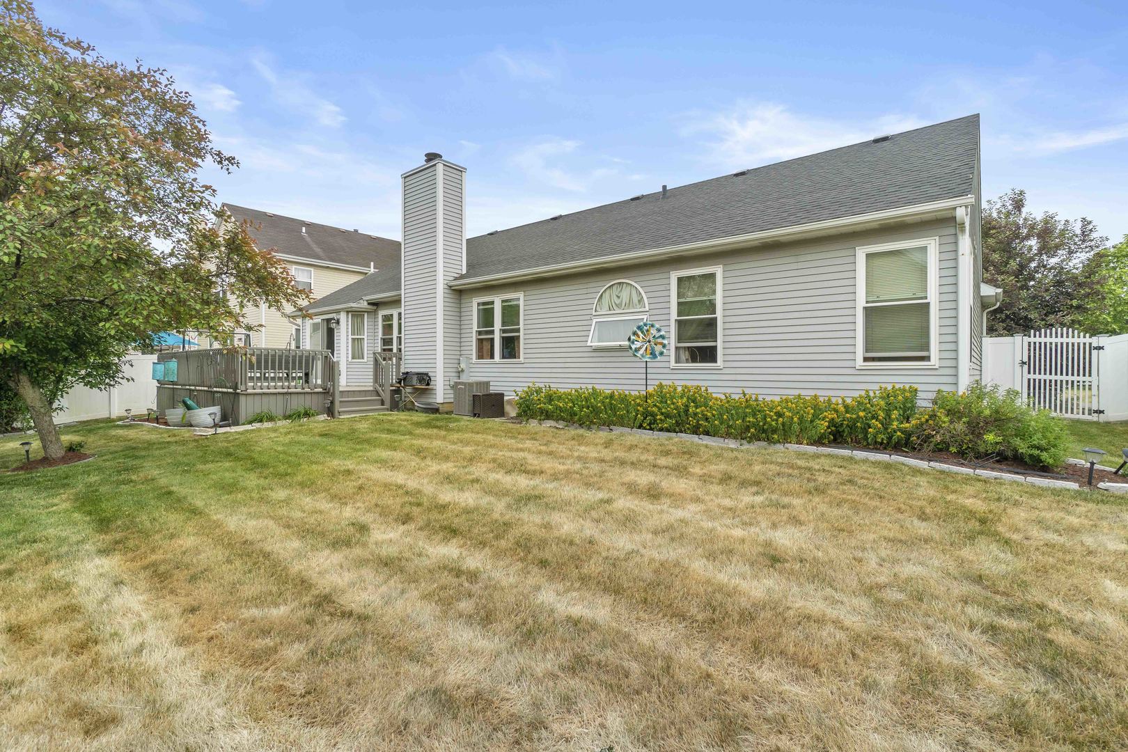 374 Fox Bend Circle Bolingbrook, IL 60440 - Photo 27 of 32 a front view of a house with garden