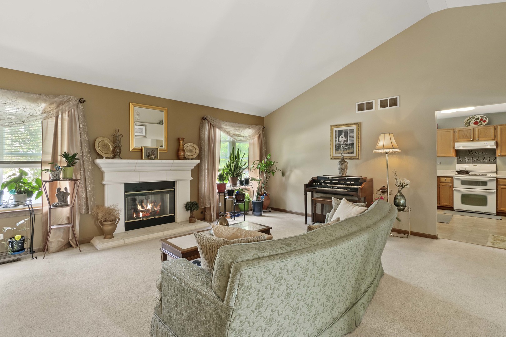 374 Fox Bend Circle Bolingbrook, IL 60440 - Photo 9 of 32 a living room with furniture and a fireplace