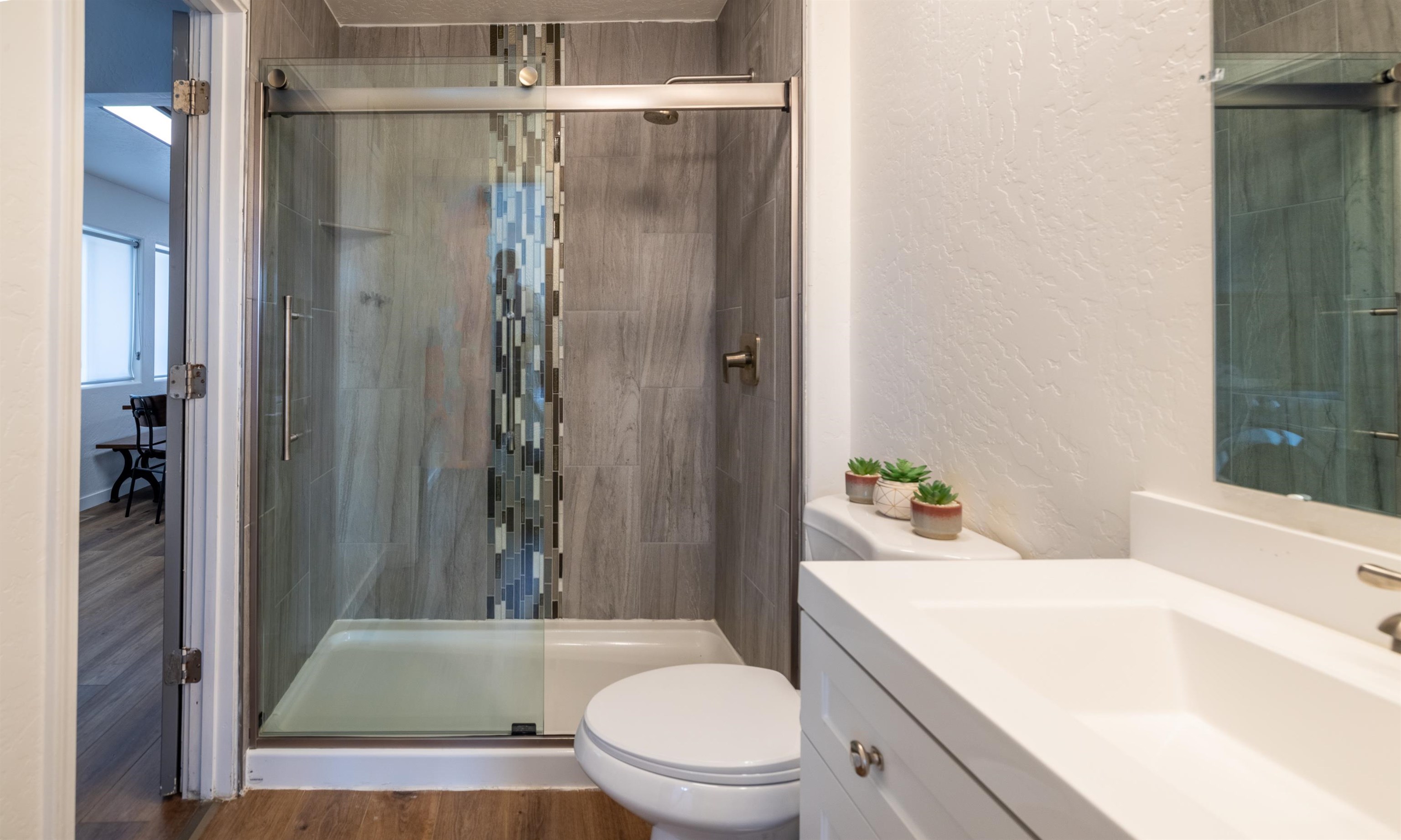137 North Willow Street Fruita, CO 81521 - Photo 12 of 27 a bathroom with a sink a toilet and shower