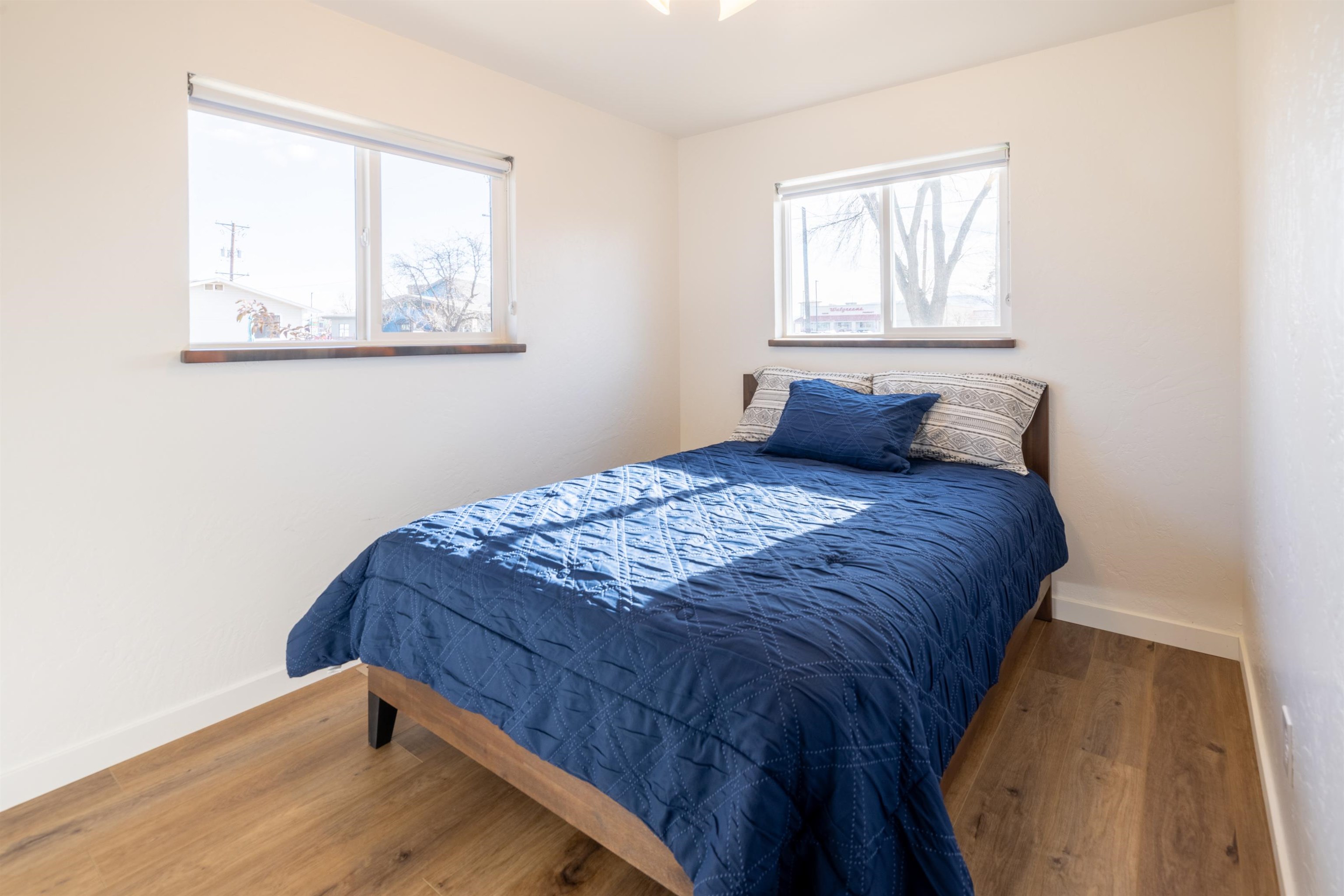 137 North Willow Street Fruita, CO 81521 - Photo 15 of 27 a bedroom with a bed and a window