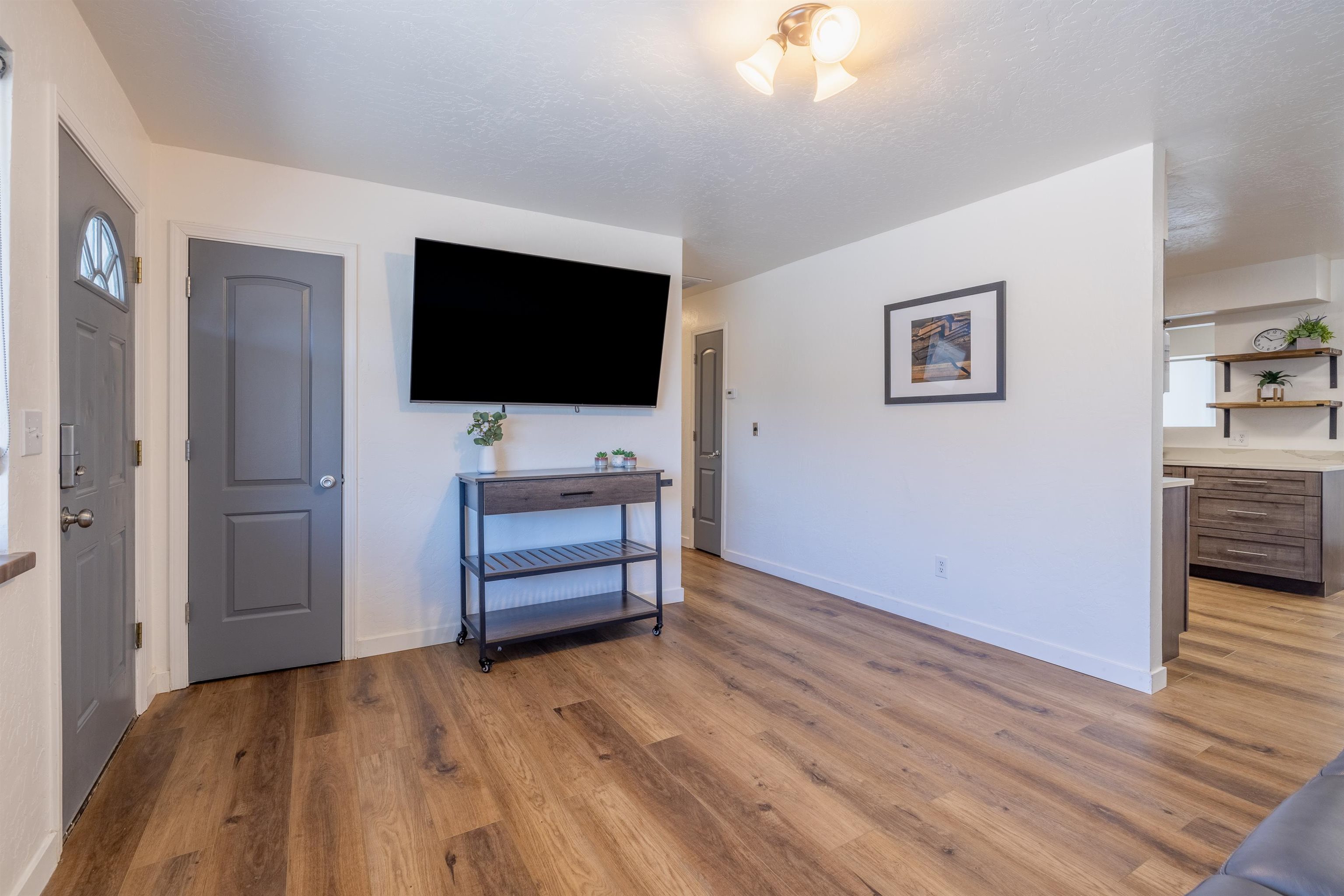 137 North Willow Street Fruita, CO 81521 - Photo 16 of 27 a room with furniture and flat screen tv