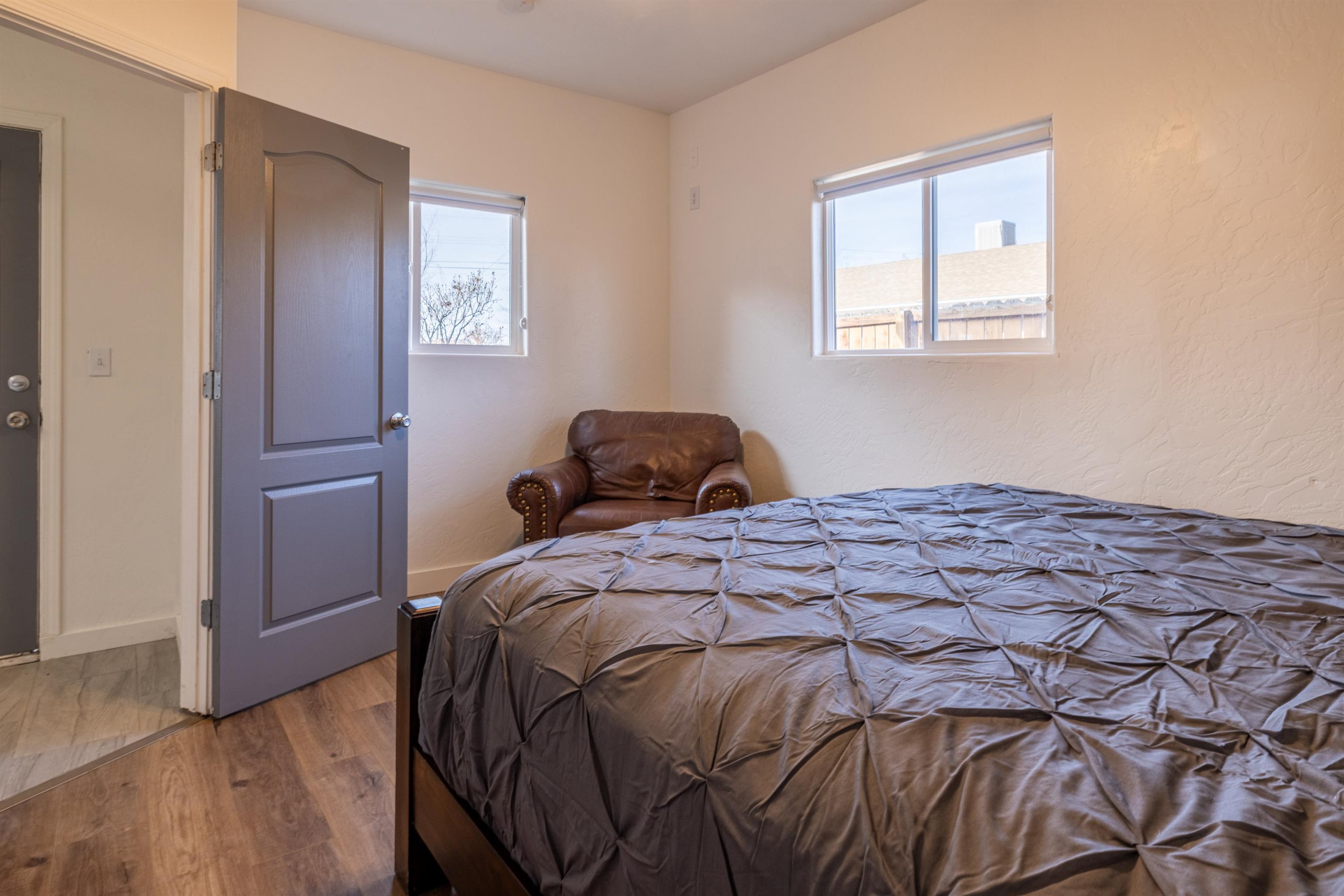 137 North Willow Street Fruita, CO 81521 - Photo 20 of 27 a bedroom with a bed and a window