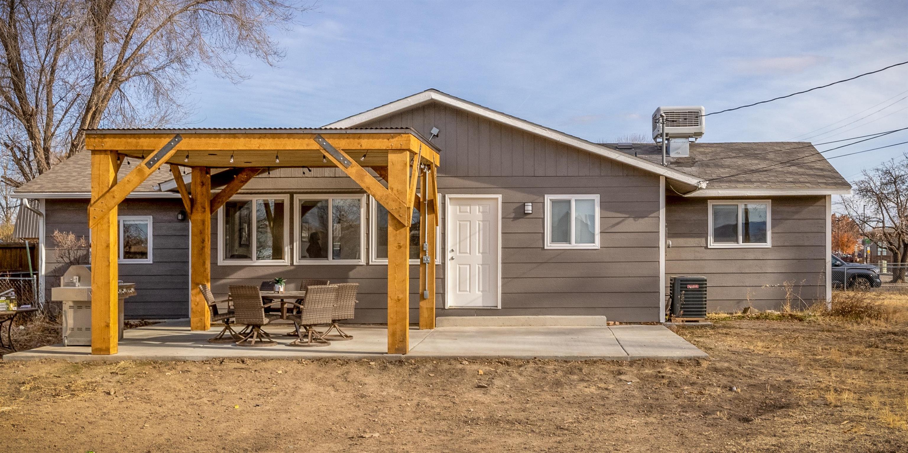 137 North Willow Street Fruita, CO 81521 - Photo 21 of 27 a front view of a house with a yard