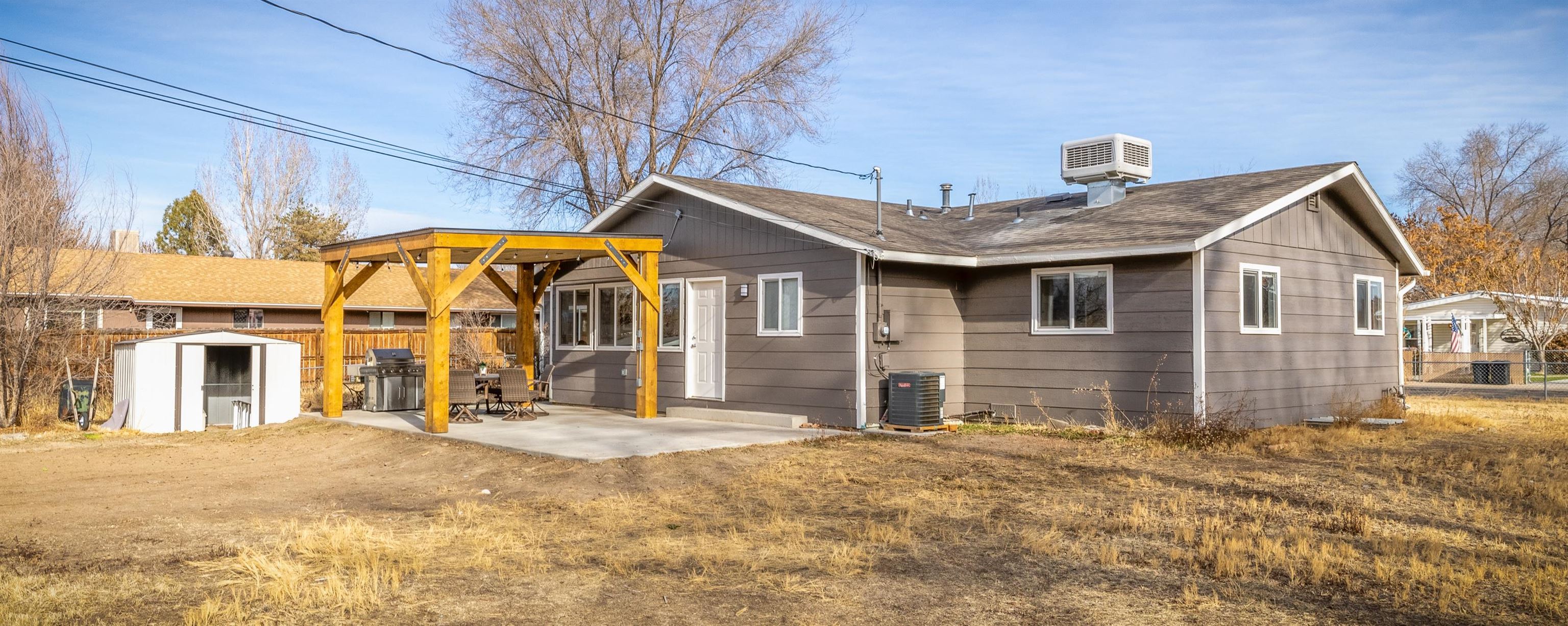 137 North Willow Street Fruita, CO 81521 - Photo 22 of 27 a front view of a house with a yard