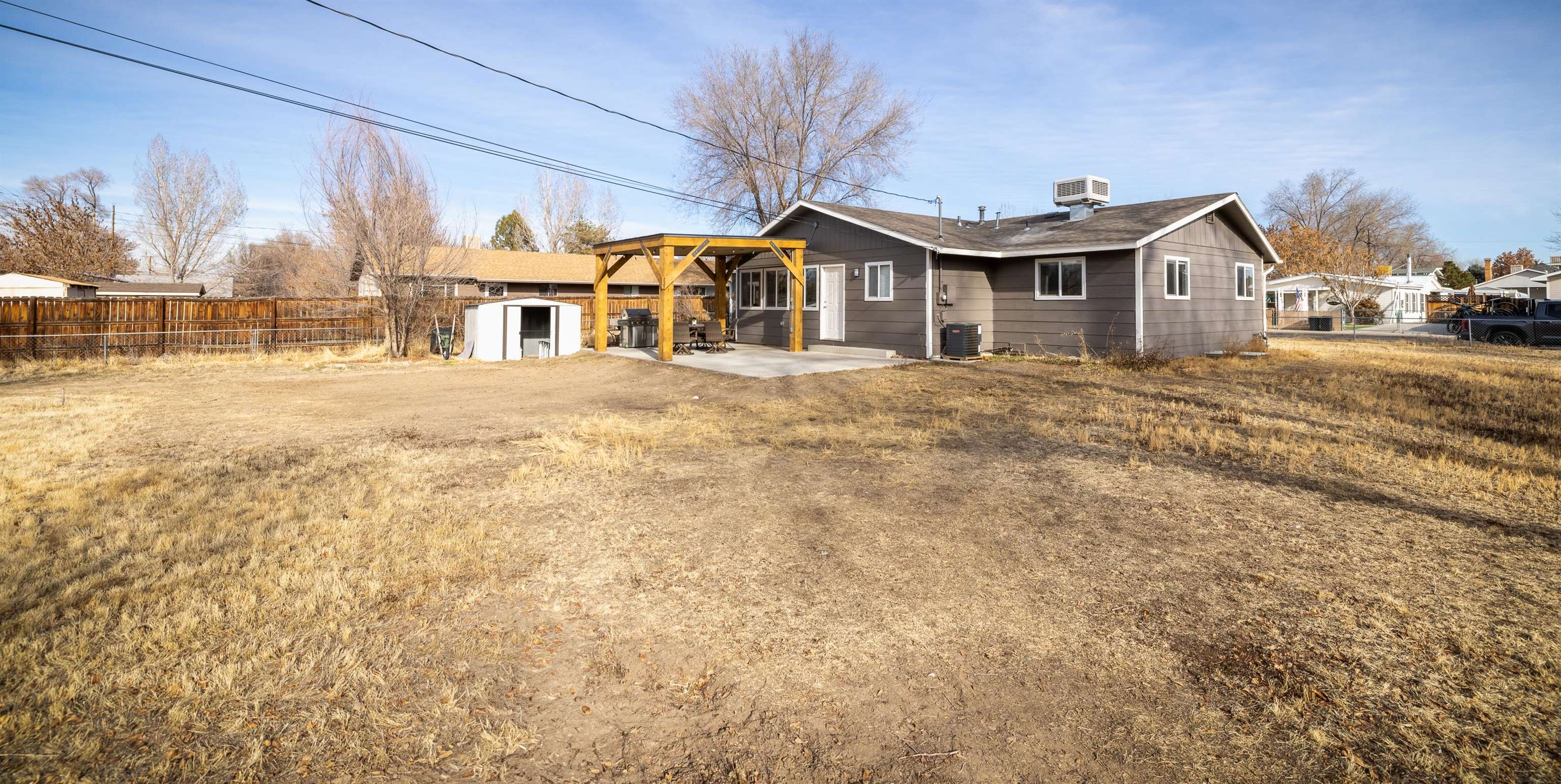 137 North Willow Street Fruita, CO 81521 - Photo 24 of 27 a front view of a house with a yard