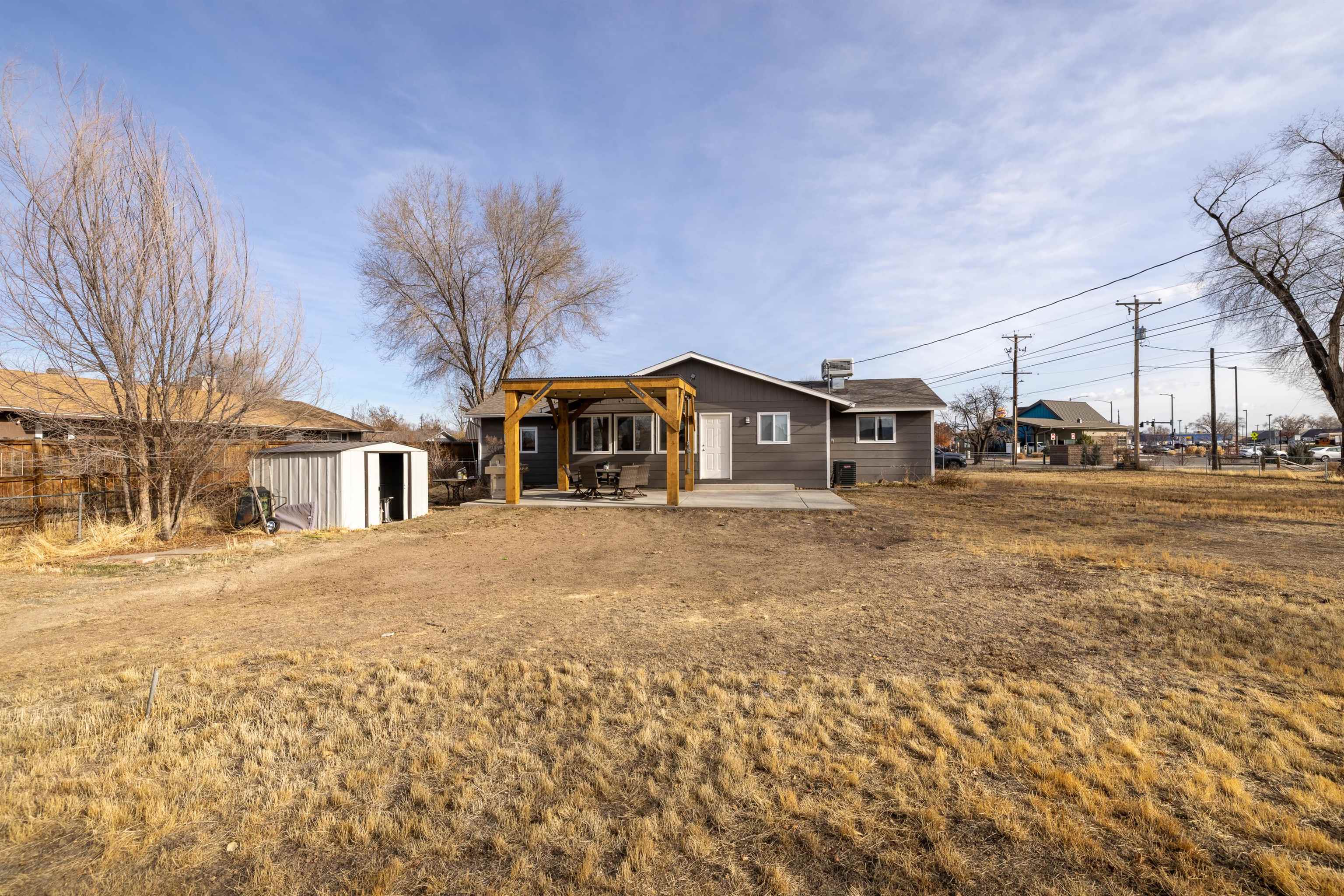 137 North Willow Street Fruita, CO 81521 - Photo 25 of 27 a front view of a house with a yard