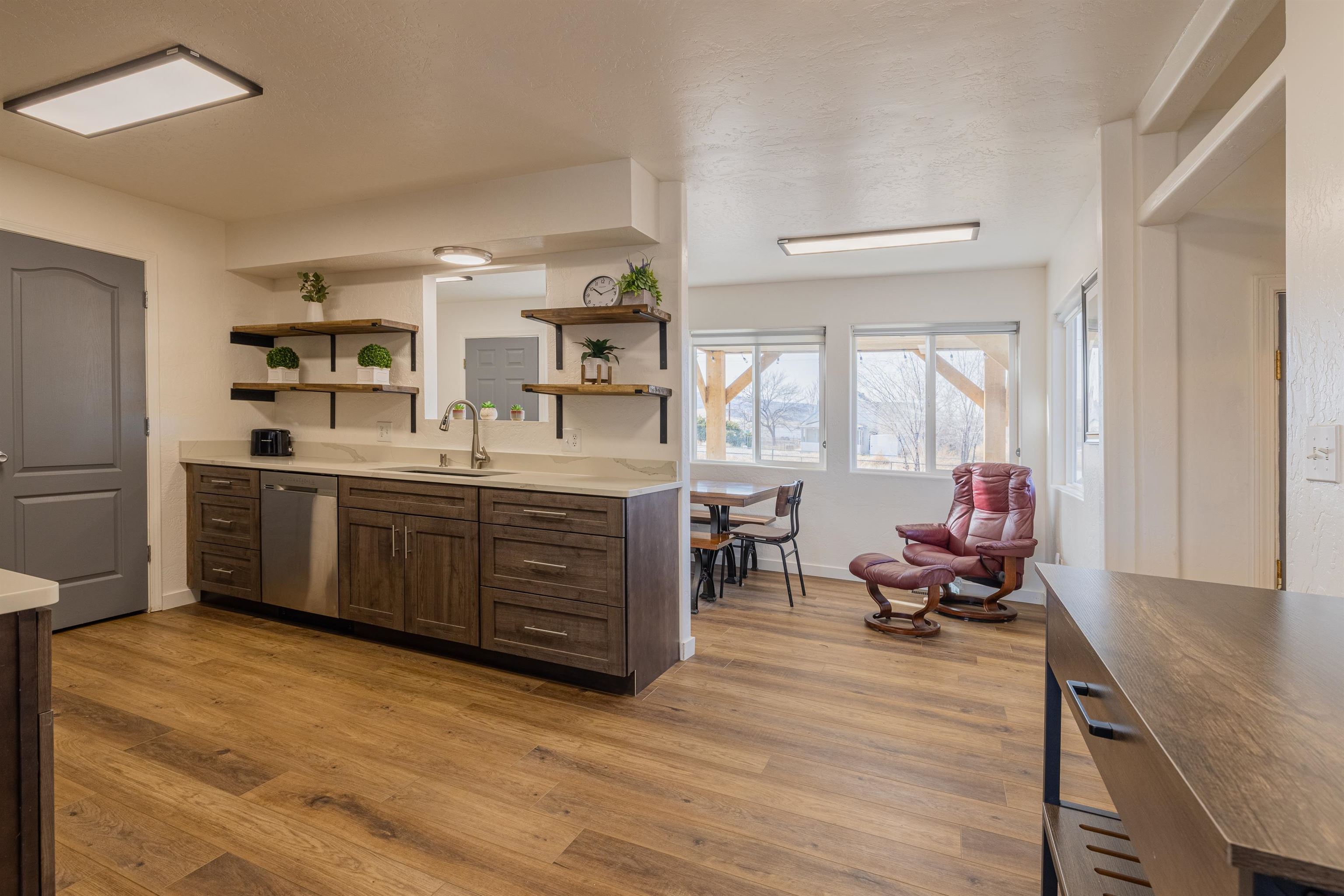 137 North Willow Street Fruita, CO 81521 - Photo 4 of 27 a kitchen with a sink appliances and wooden cabinets