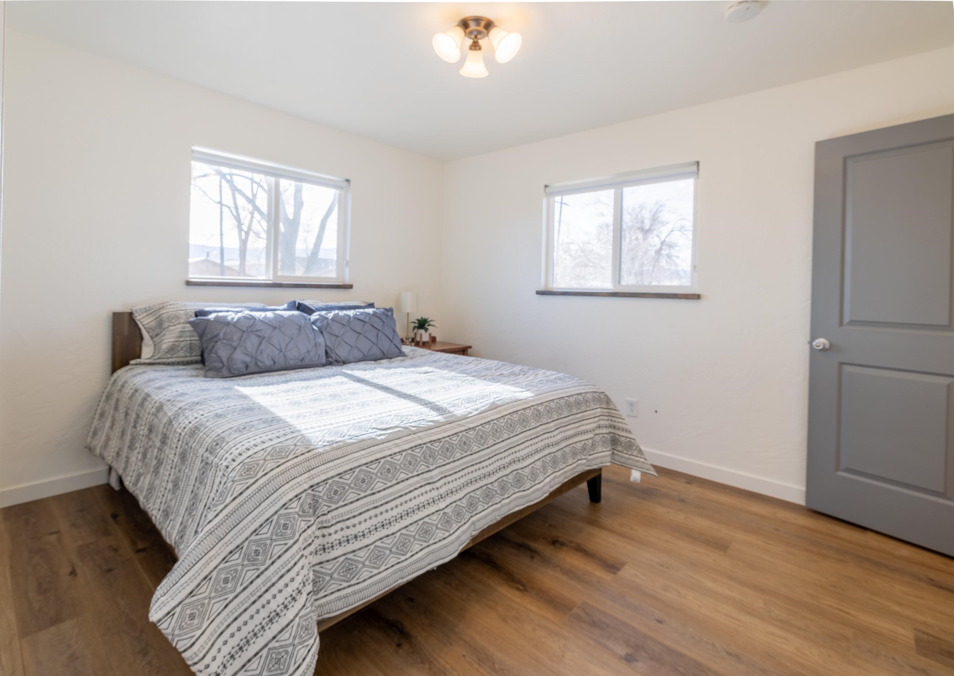 137 North Willow Street Fruita, CO 81521 - Photo 9 of 27 a bedroom with a bed and a window