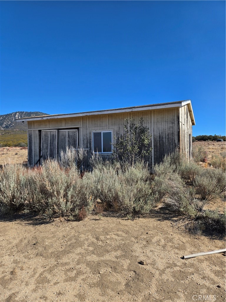 36650 Bautista Road Anza, CA 92539 - Photo 15 of 16 a view of a dry yard with wooden fence