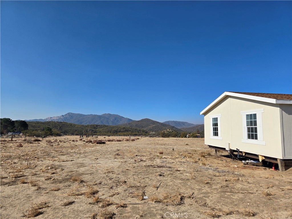 36650 Bautista Road Anza, CA 92539 - Photo 2 of 16 a view of a house with a yard