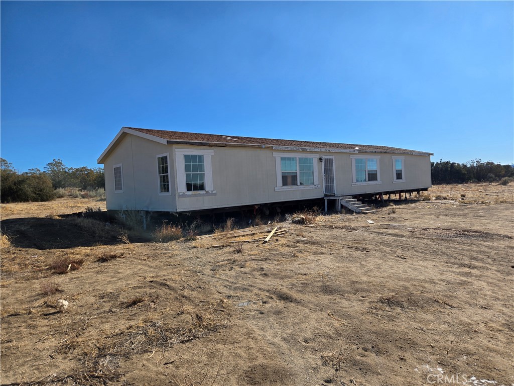 36650 Bautista Road Anza, CA 92539 - Photo 3 of 16 a view of a house with a yard