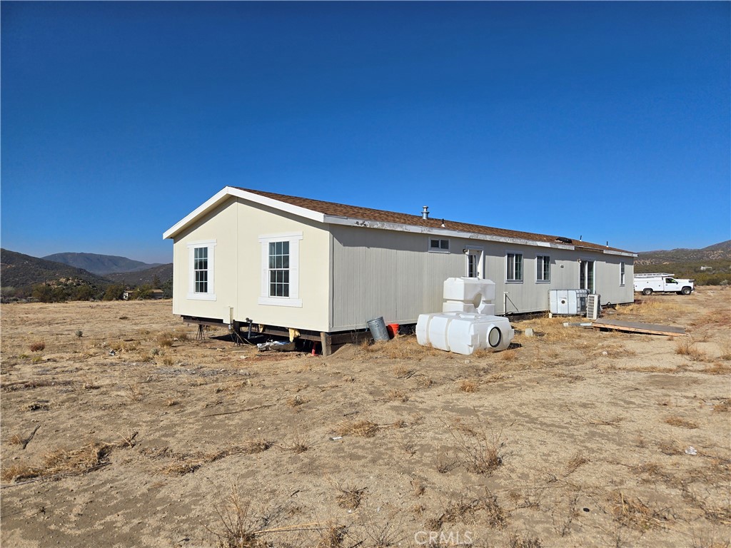36650 Bautista Road Anza, CA 92539 - Photo 5 of 16 a view of a house with a yard