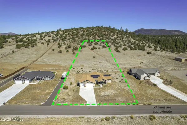 a view of a terrace with couches and city view