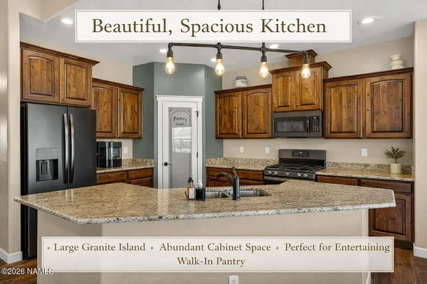 a spacious bathroom with a double vanity sink and a mirror